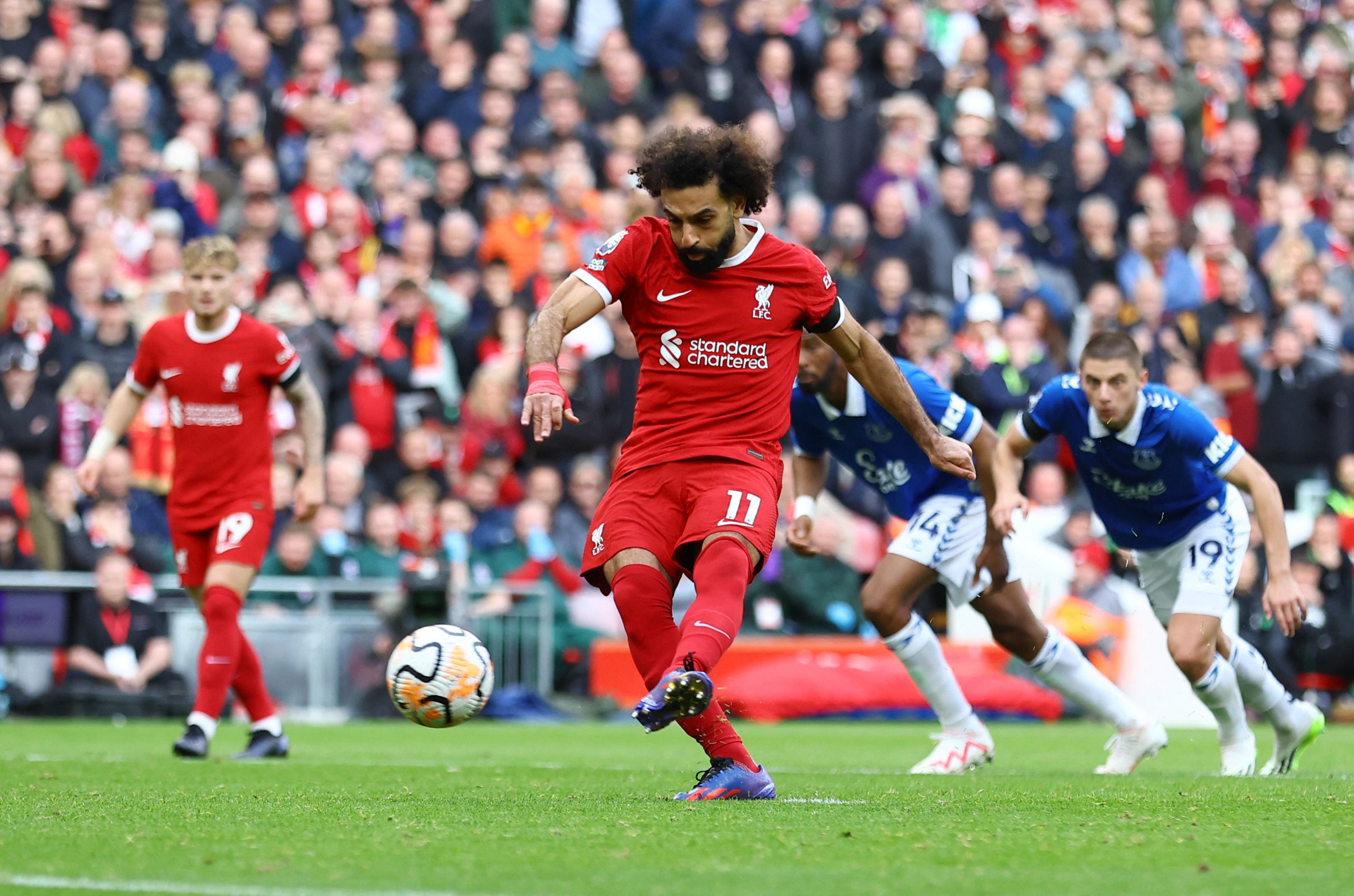 Salah gives Liverpool the lead from the penalty spot