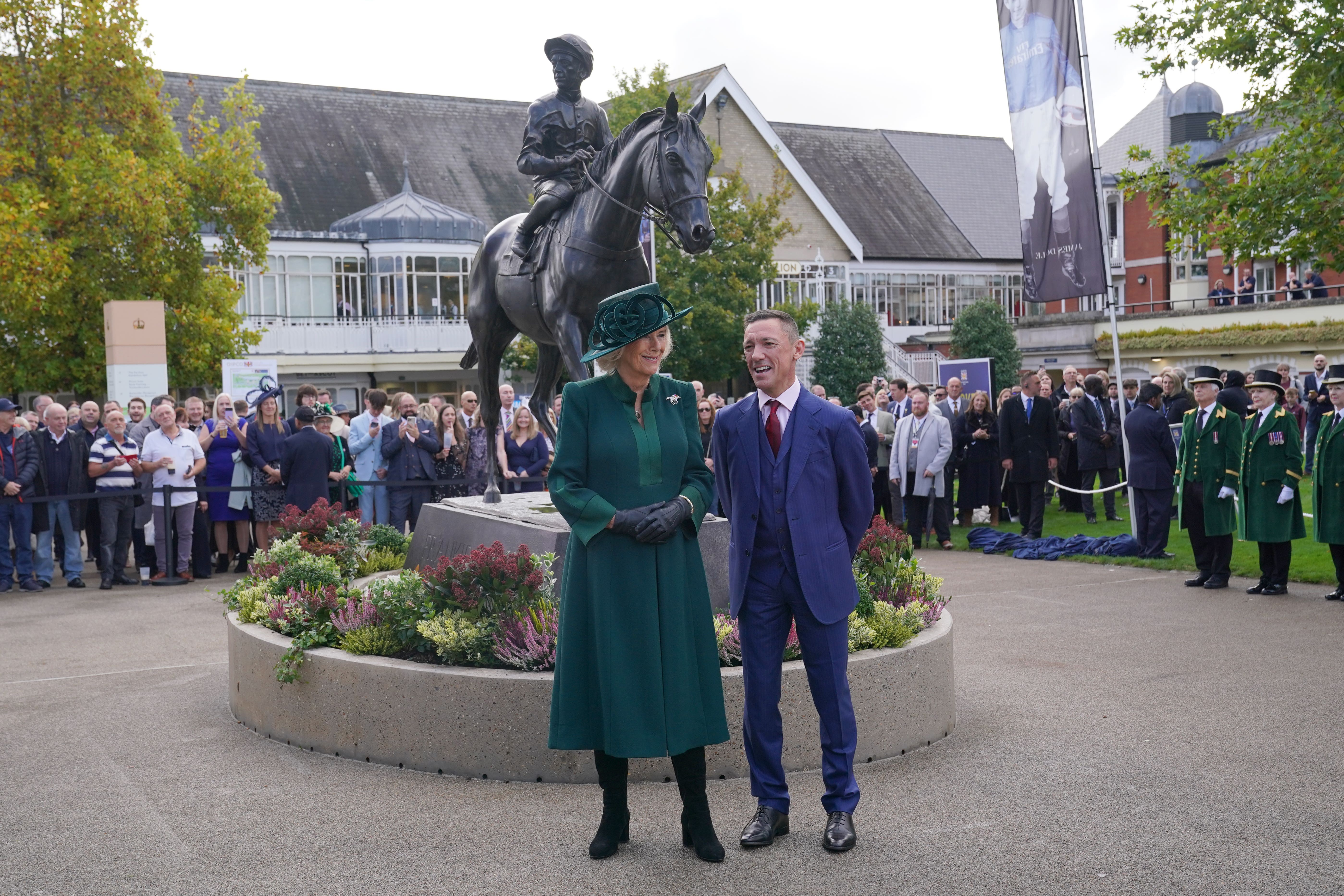 Queen Camilla with Frankie Dettori as she attends the QIPCO British Champions Day at Ascot Racecourse in Berkshire (Lucy North/PA)