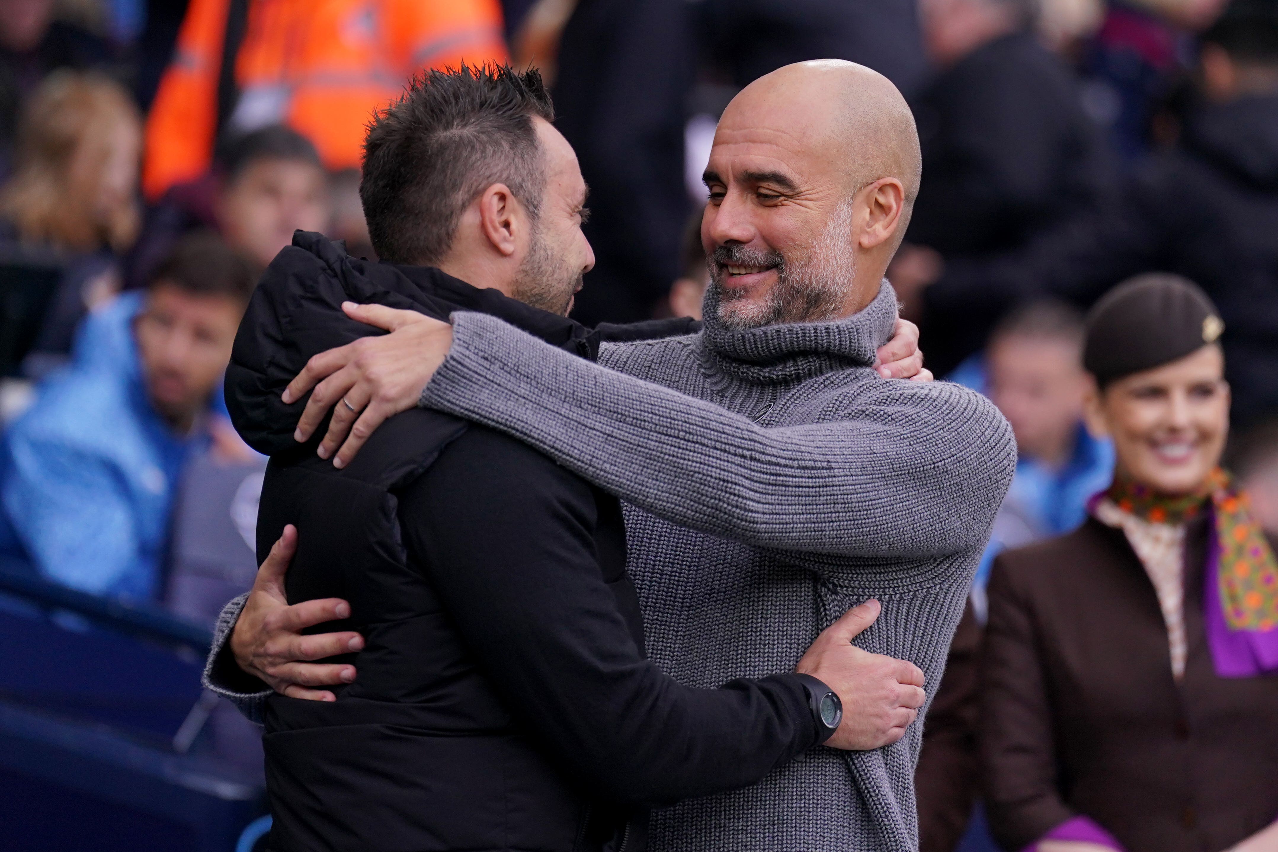 Pep Guardiola, right, hailed Brighton boss Roberto De Zerbi (Tim Goode/PA)