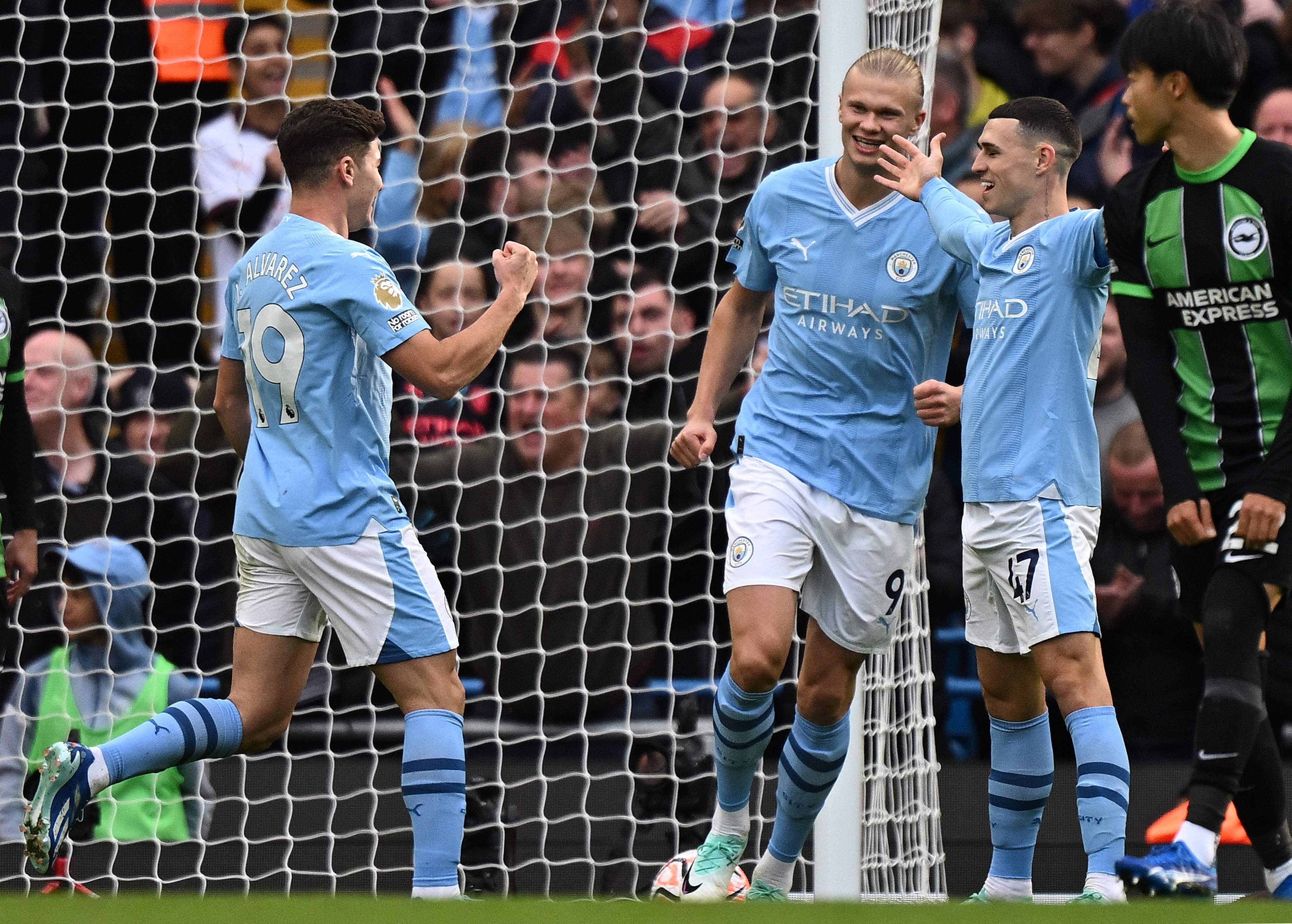 Manchester City’s Argentinian striker Julian Alvarez celebrates scoring the opening goa