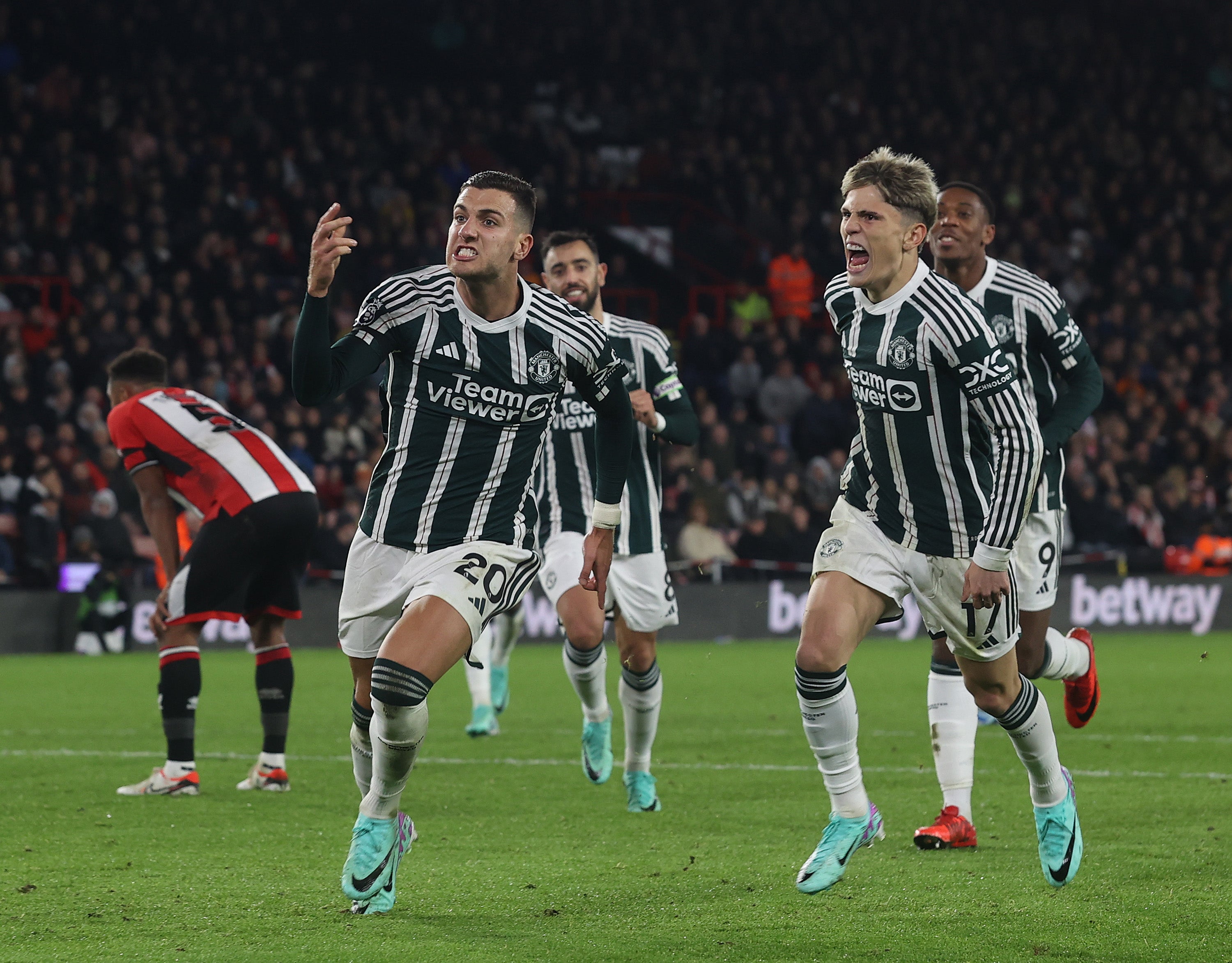 Diogo Dalot celebrates after lashing home Manchester United’s winning goal