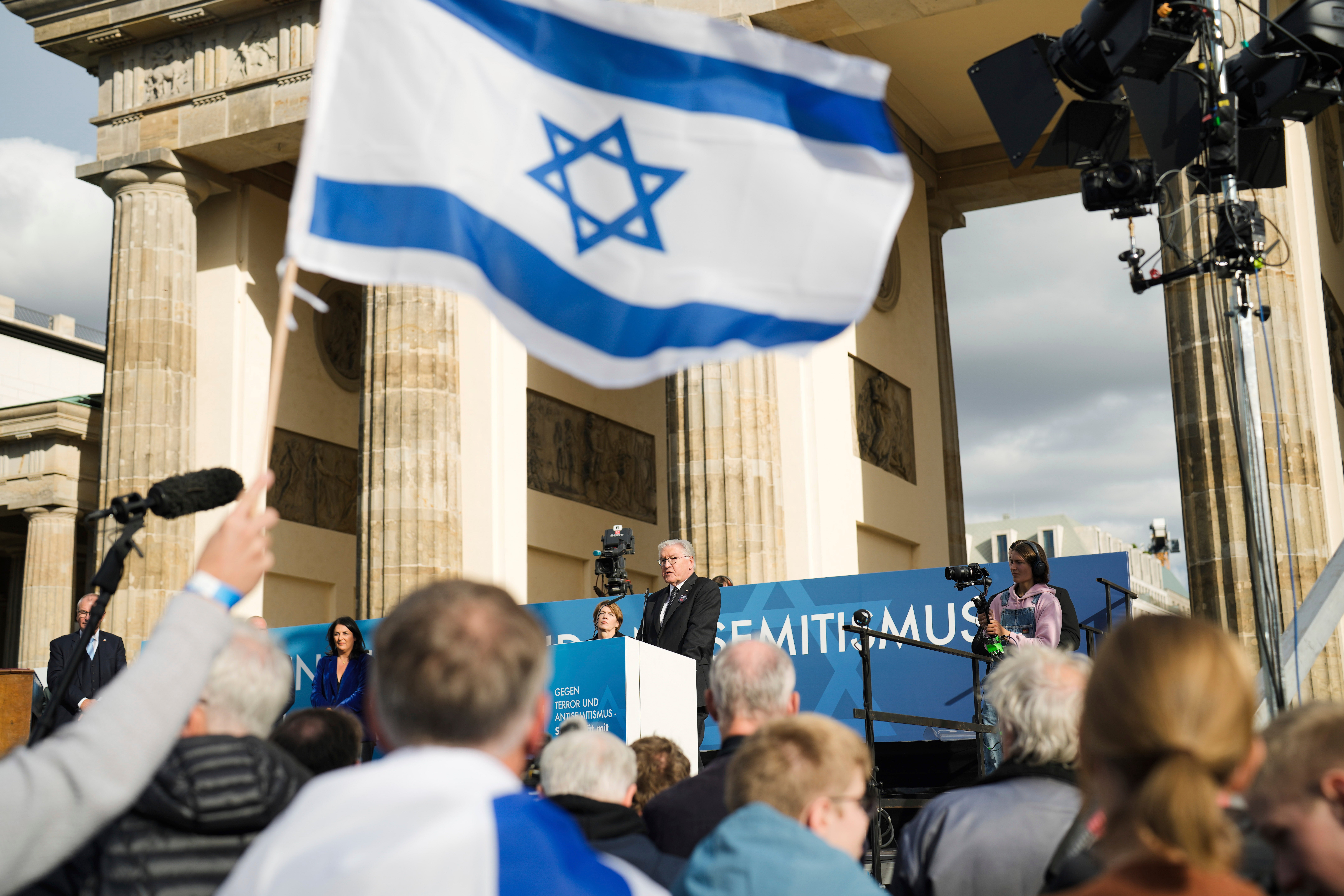 German president Frank-Walter Steinmeier, centre, speaks during a demonstration against antisemitism and to show solidarity with Israel in Berlin, on 22 October