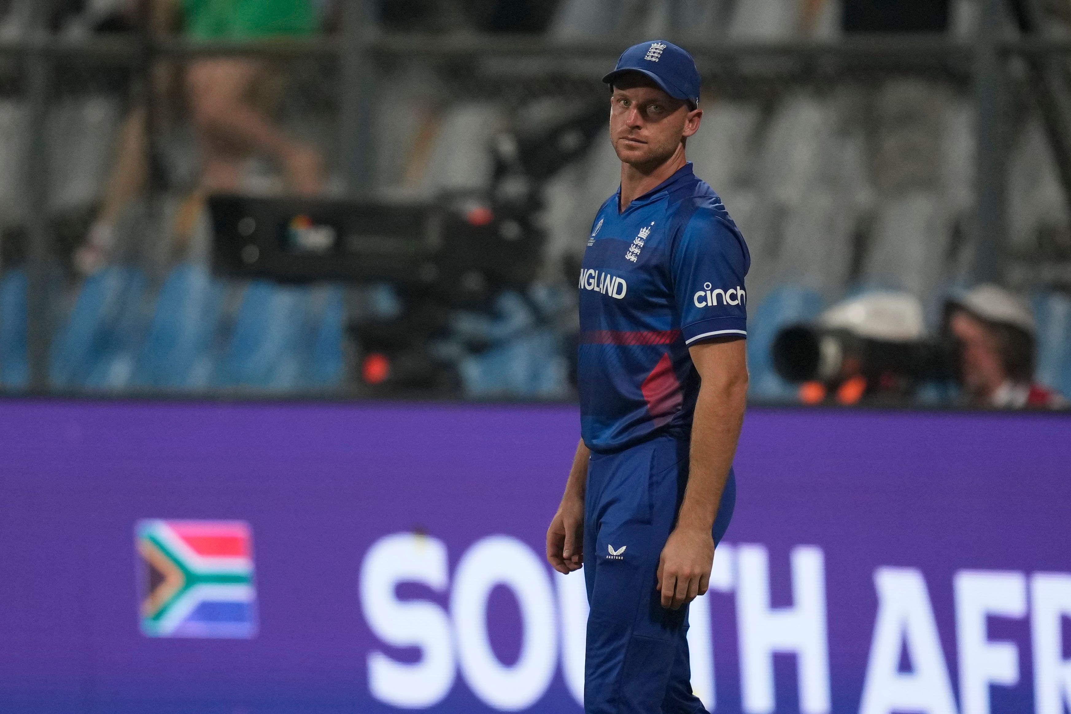 Jos Buttler’s side stand on the brink of elimination (Rafiq Maqbool/AP)