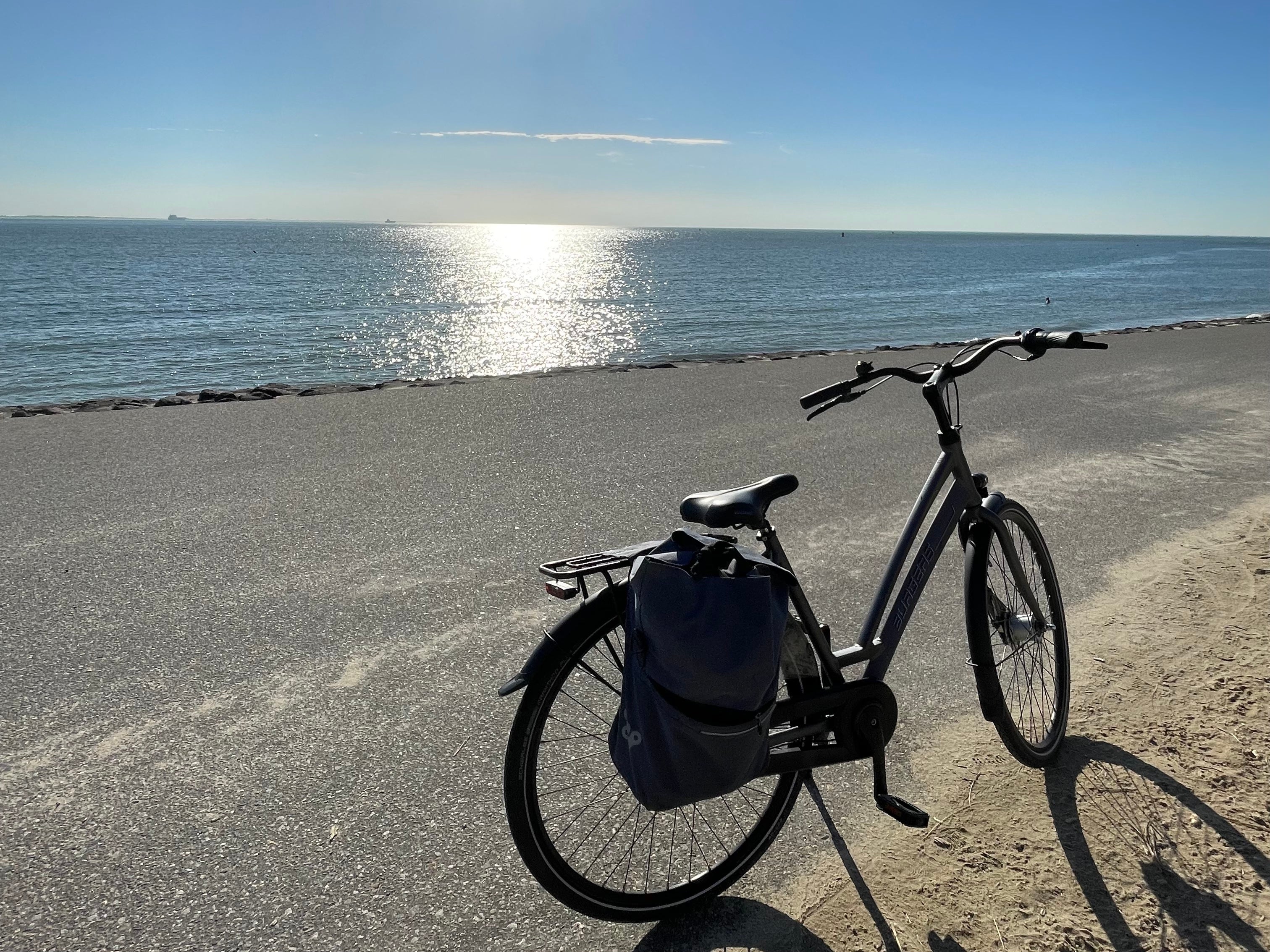 Solo cycling: Jini takes in the view from Westduin Beach, Vlissingen