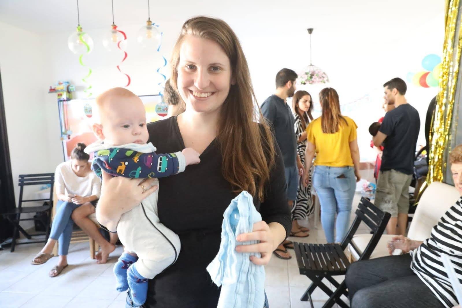 Kfir with his mother, Shiri, who Hamas said was also dead