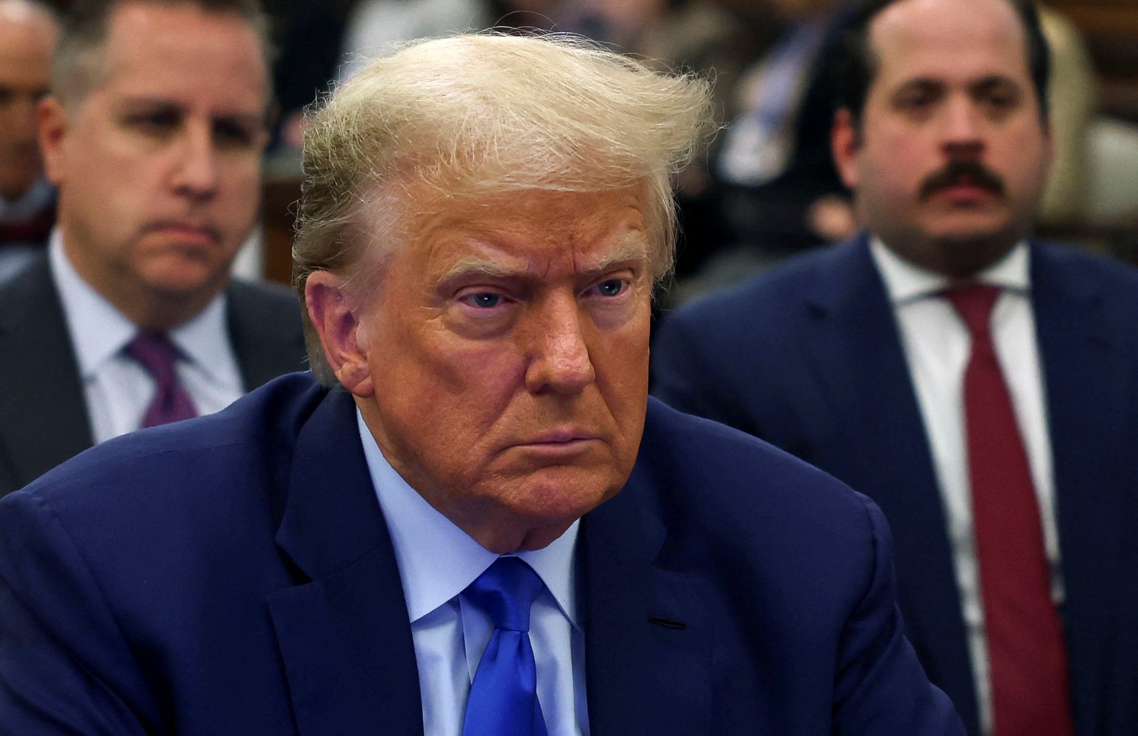 Donald Trump appears with his attorneys at the beginning of a fourth week of his civil fraud trial inside New York Supreme Court on 24 October.