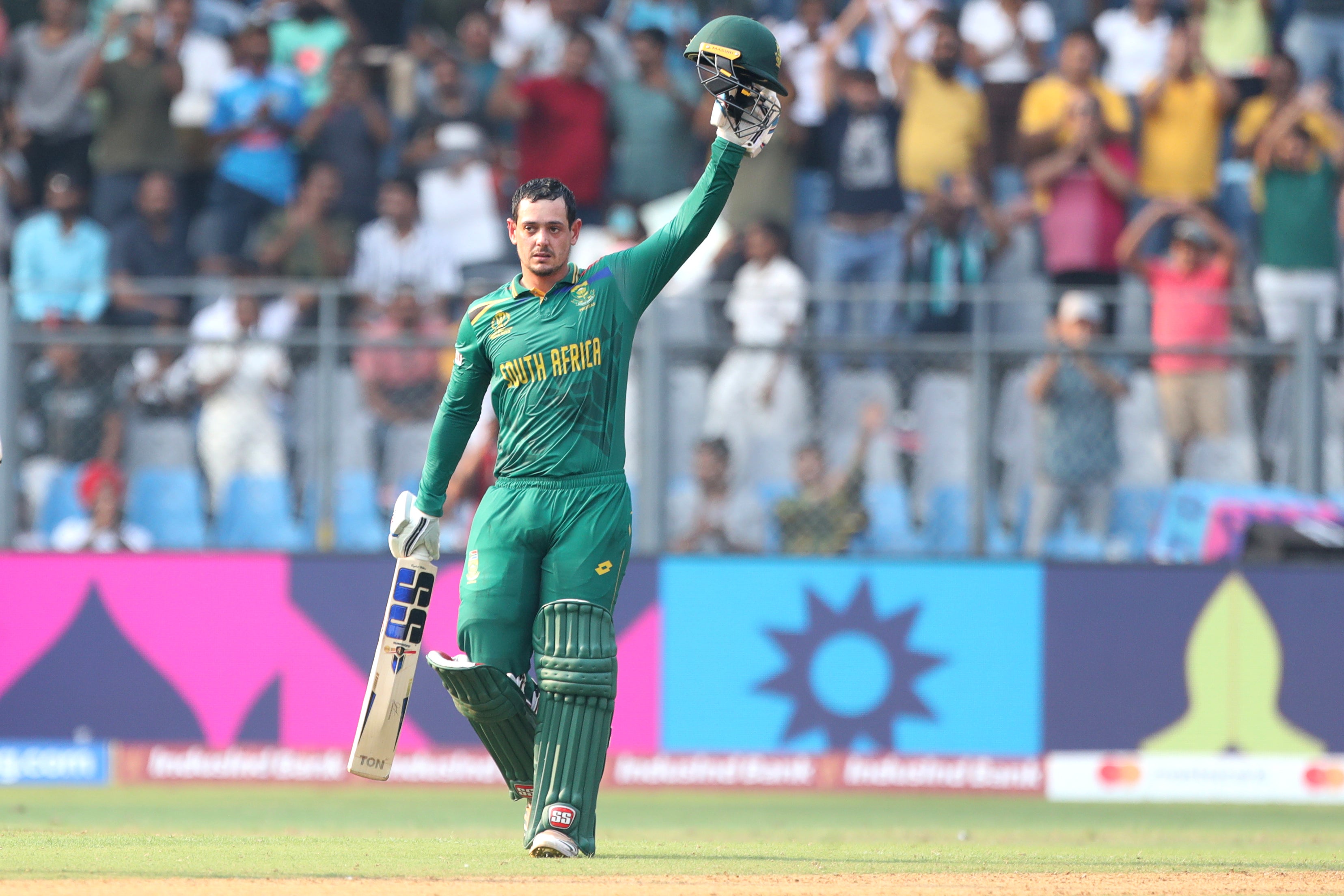 Quinton de Kock of South Africa celebrates after scoring a hundred during the ICC Men's Cricket World Cup 2023 match between South Africa and Bangladesh