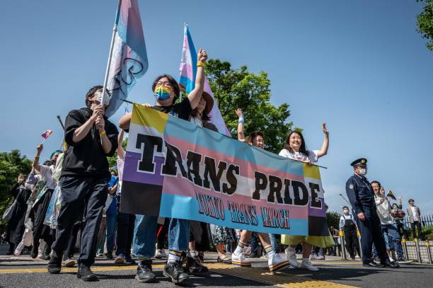 People attend the Tokyo Rainbow Pride 2023 Parade in Tokyo on 23 April 2023