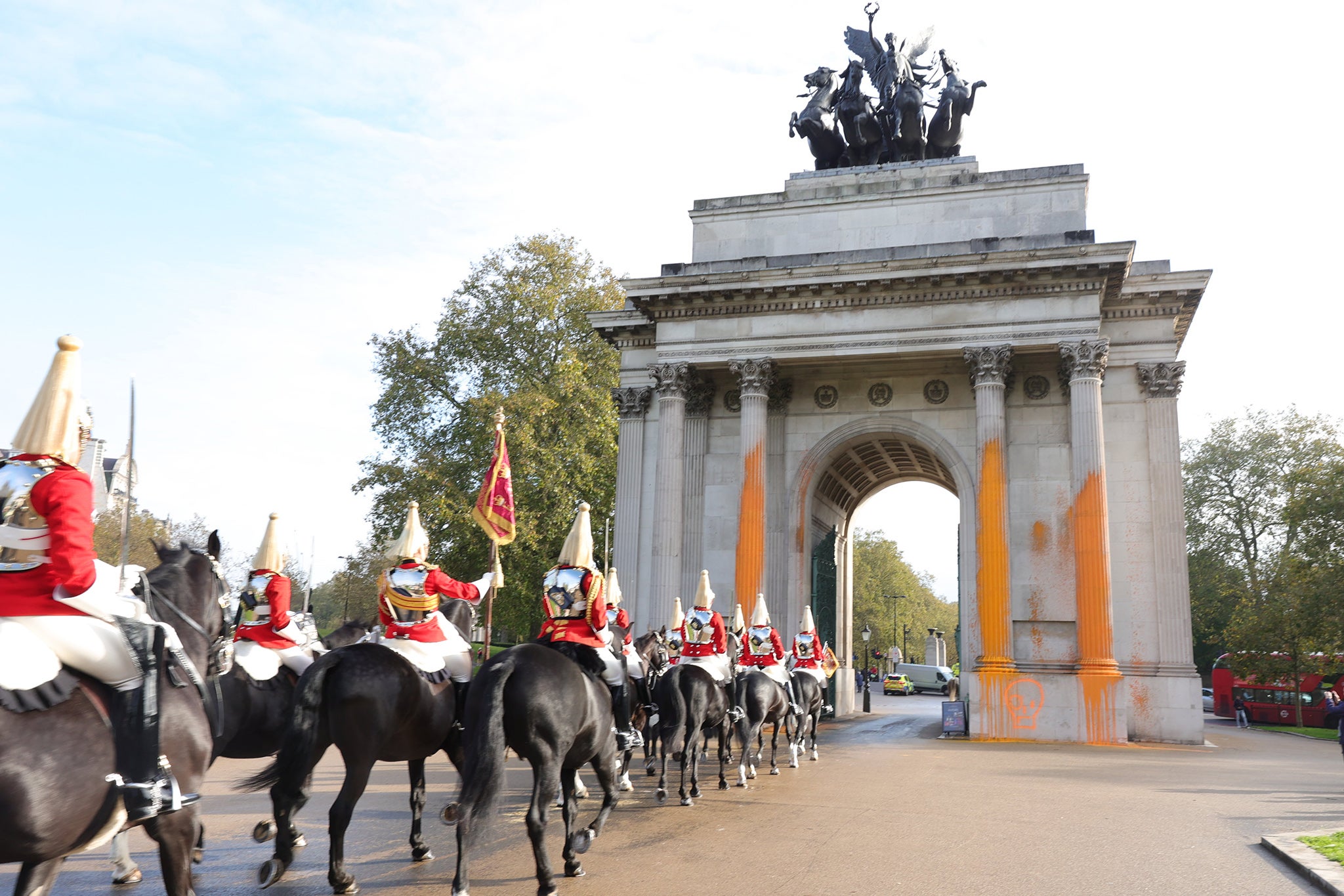 Just Stop Oil protestors sprayed orange paint over Wellington Arch in London on Wednesday morning