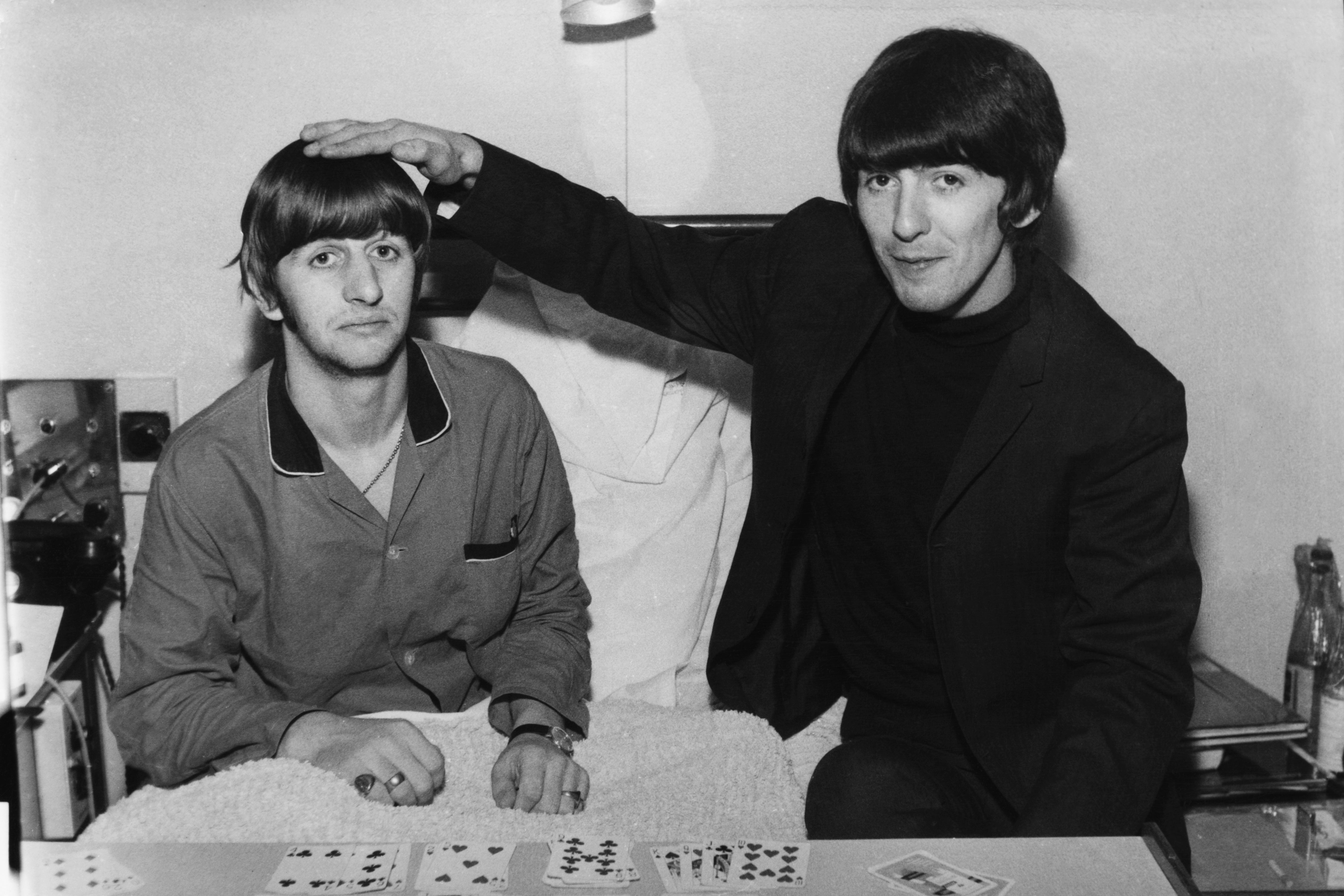 Old friends: Harrison pictured visiting Starr in hospital following the drummer’s tonsil removal in 1964