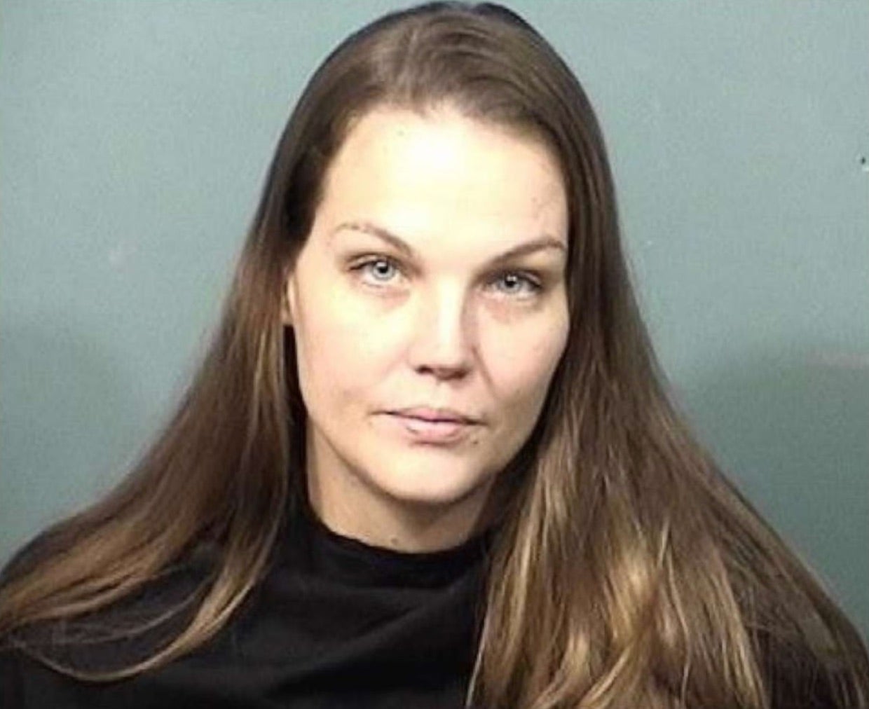 Jamie Gunn is accused of leaving her two children in a car to visit a bar