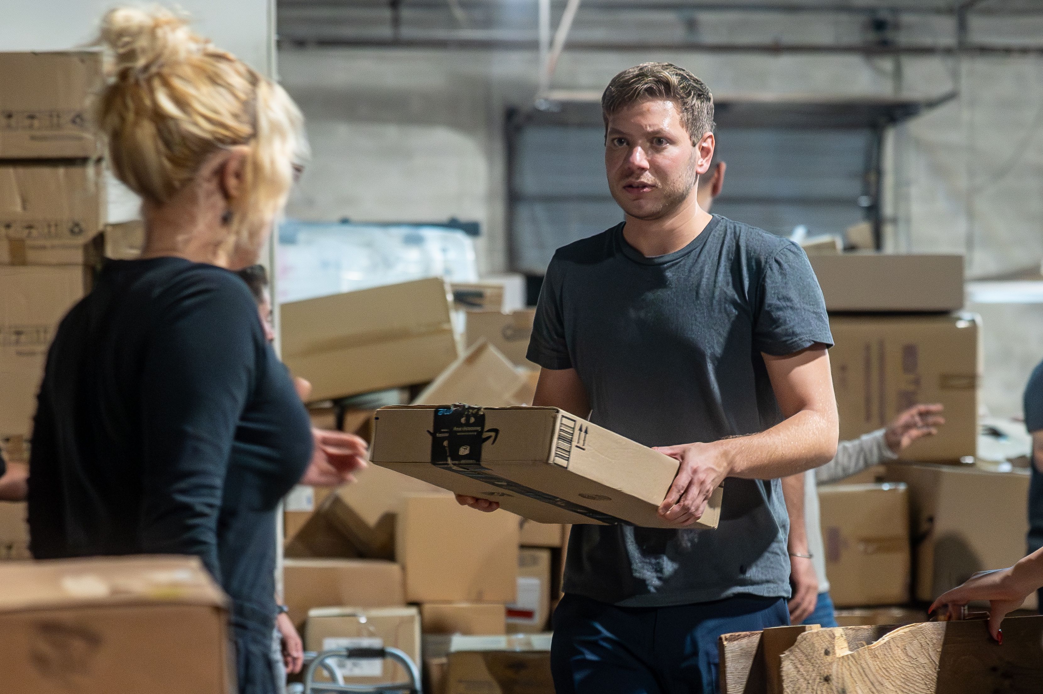 Yair Netanyau, son of Israeli Prime Minister Benjamin Netanyahu, assists in sorting donated supplies to IDF soldiers and Israeli families impacted by the Israel-Hamas war, with NGO Yedidim USA