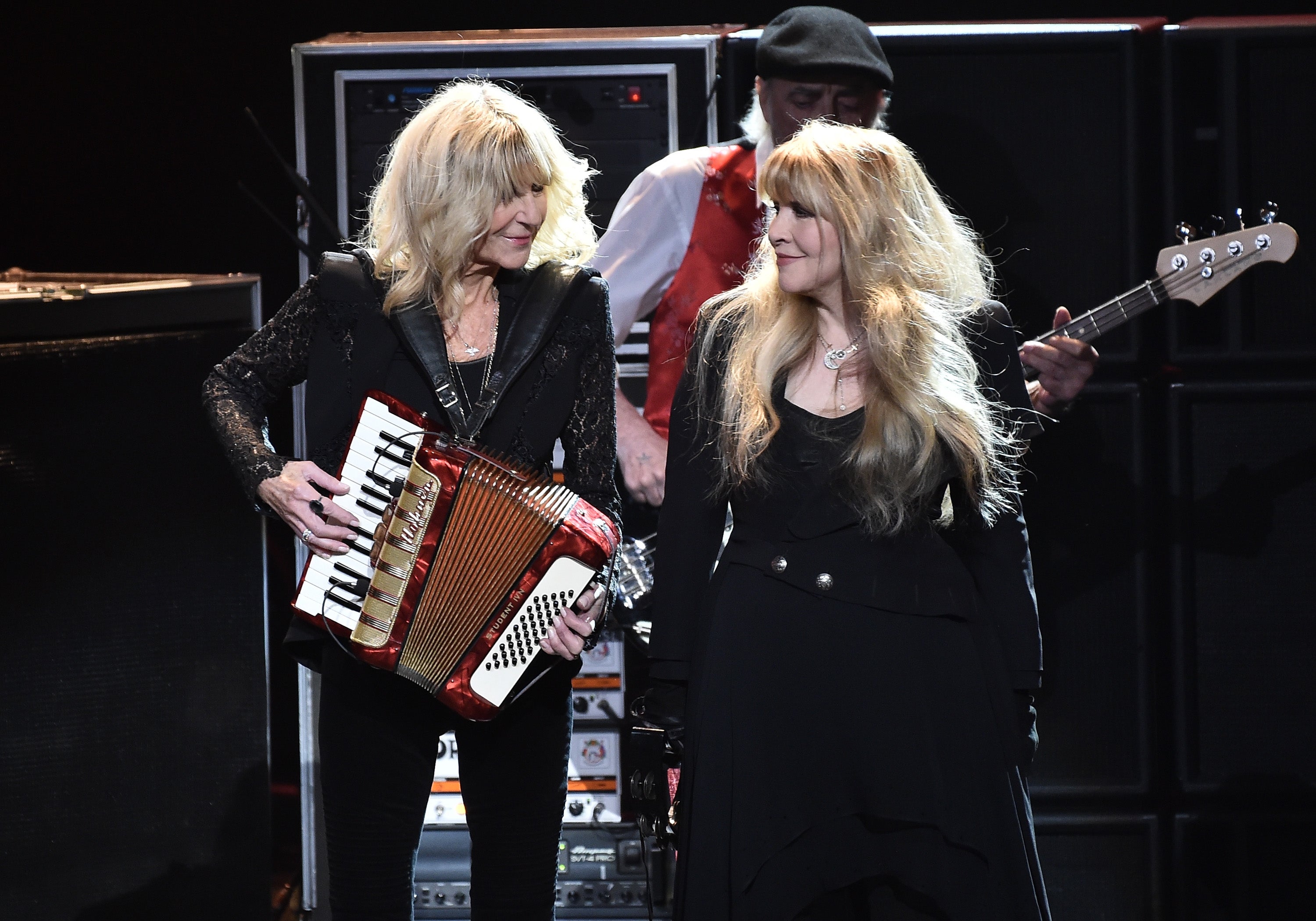 McVie (left) on stage with Stevie Nicks and Fleetwood Mac in 2018