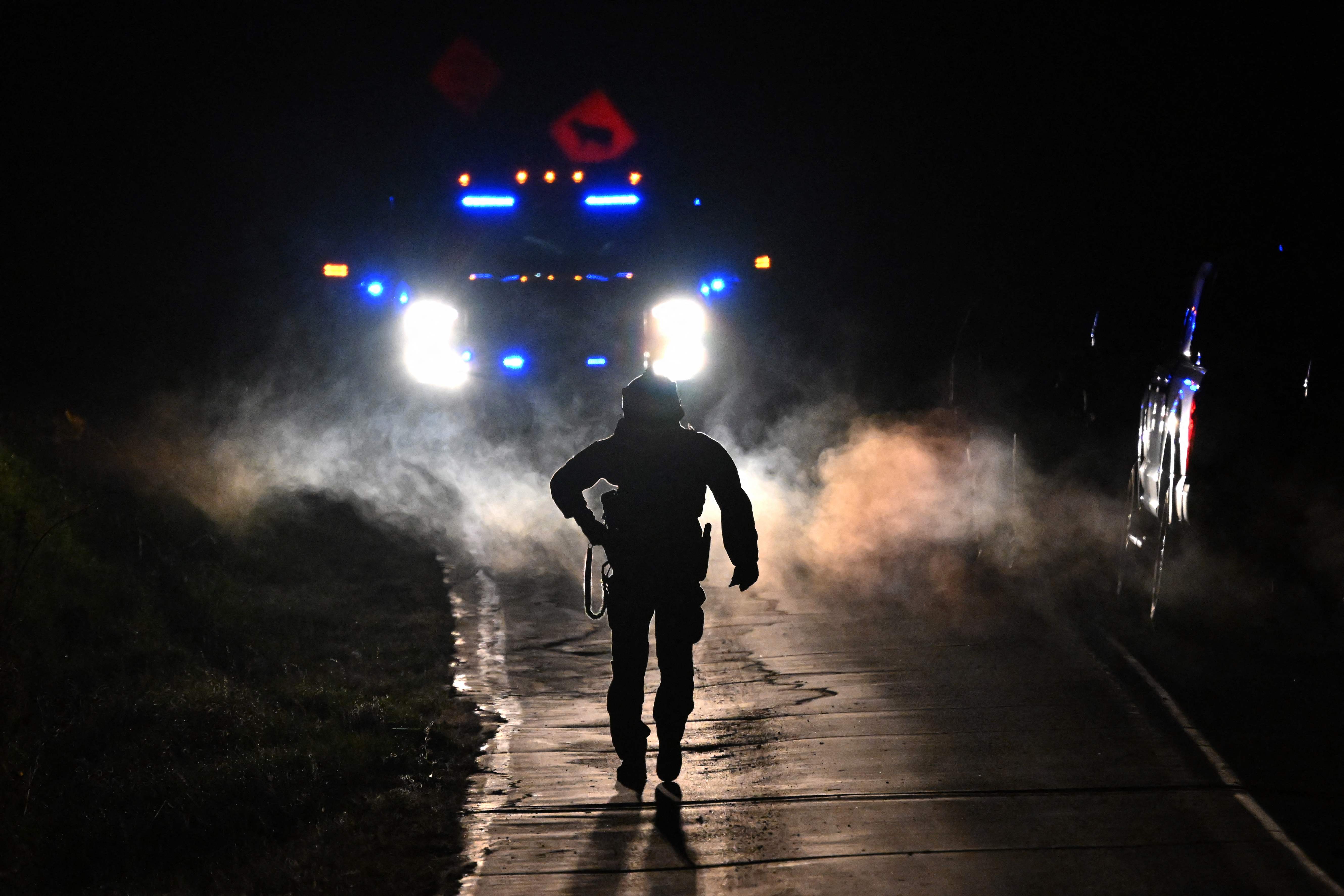 Law enforcement on the scene of search for Robert Card