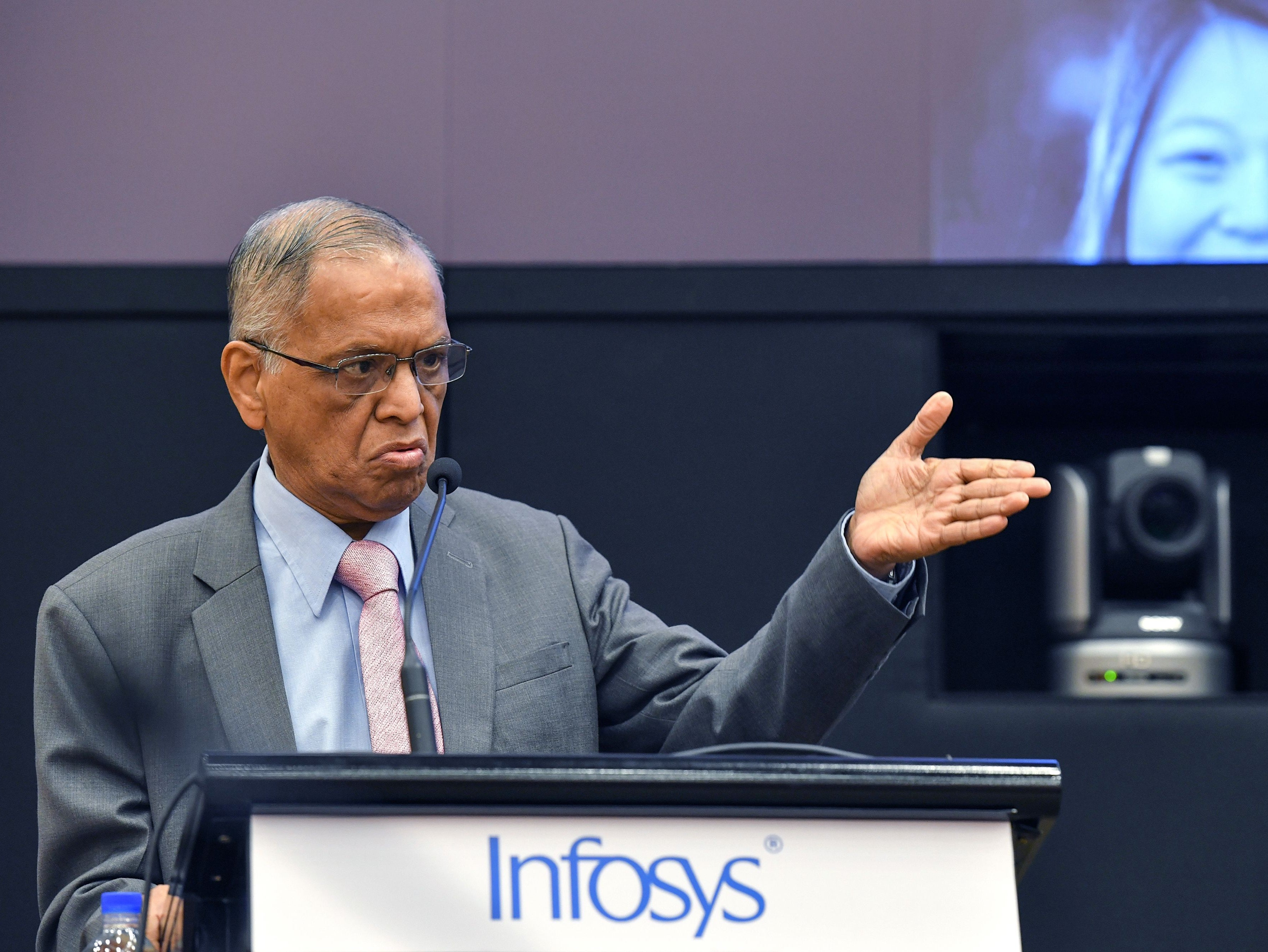 Narayana Murthy, co-founder of Indian technology company Infosys, gestures as he speaks for a panel discussion held at the company headquarters at the Electronic City in Bangalore on 7 February 2019