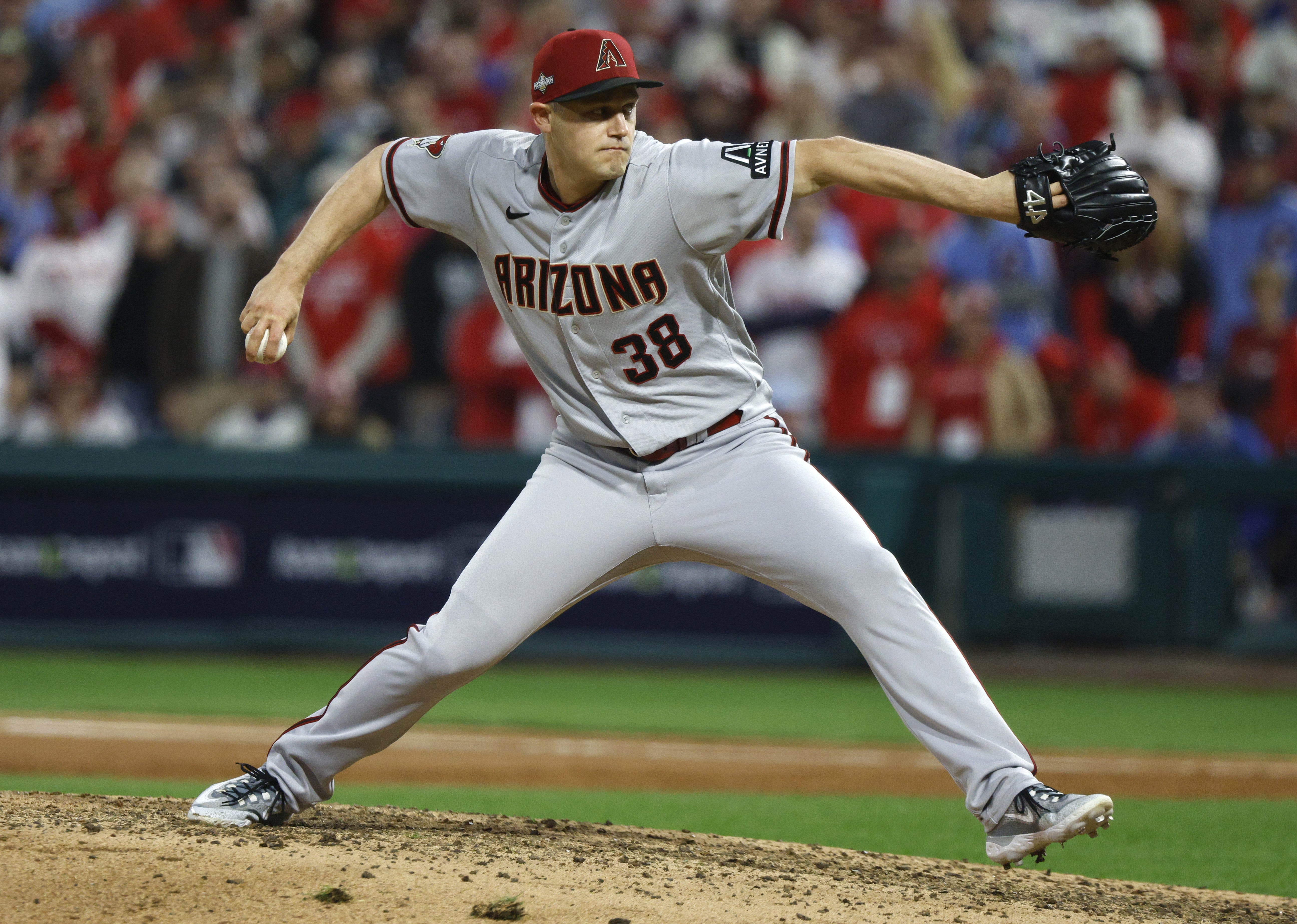 Arizona Diamondbacks relief pitcher Paul Sewald winds up for a pitch