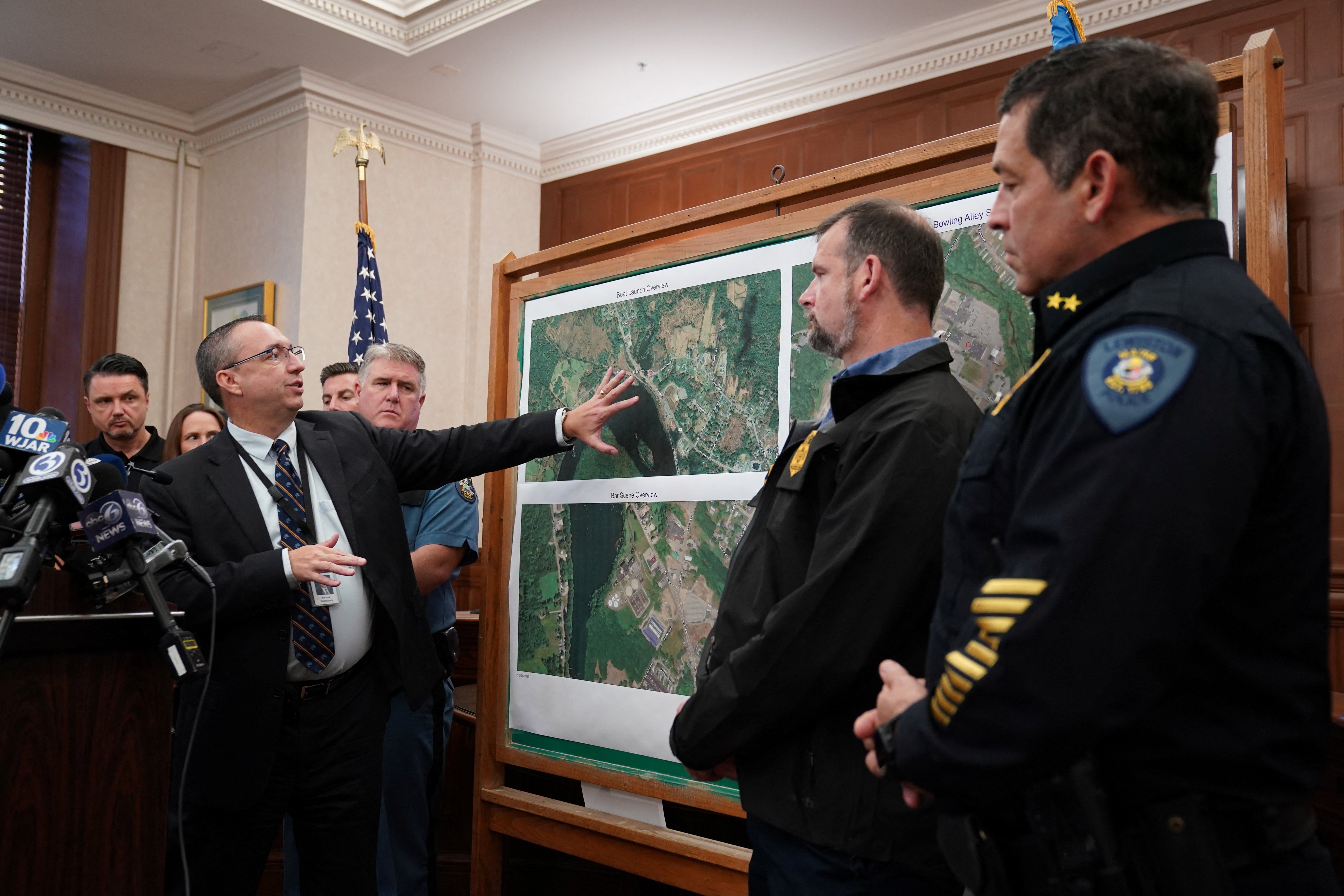 Maine Commissioner of Public Safety Michael Sauschuck speaks at a press conference at City Hall in Lewiston