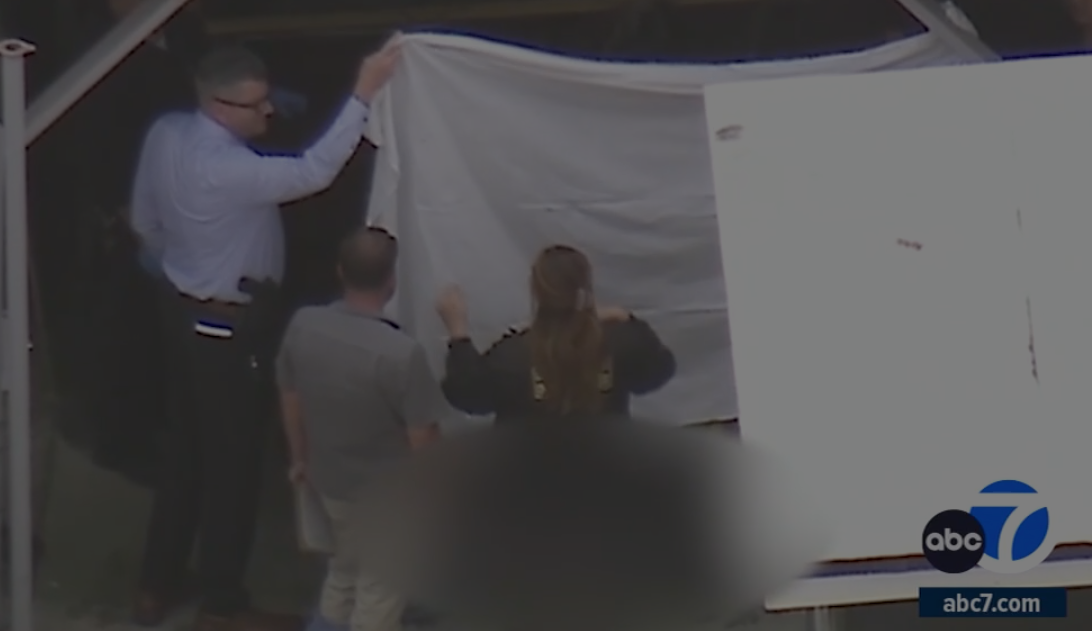 Moment police remove a decapitated head from a trash can at a home in Los Angeles