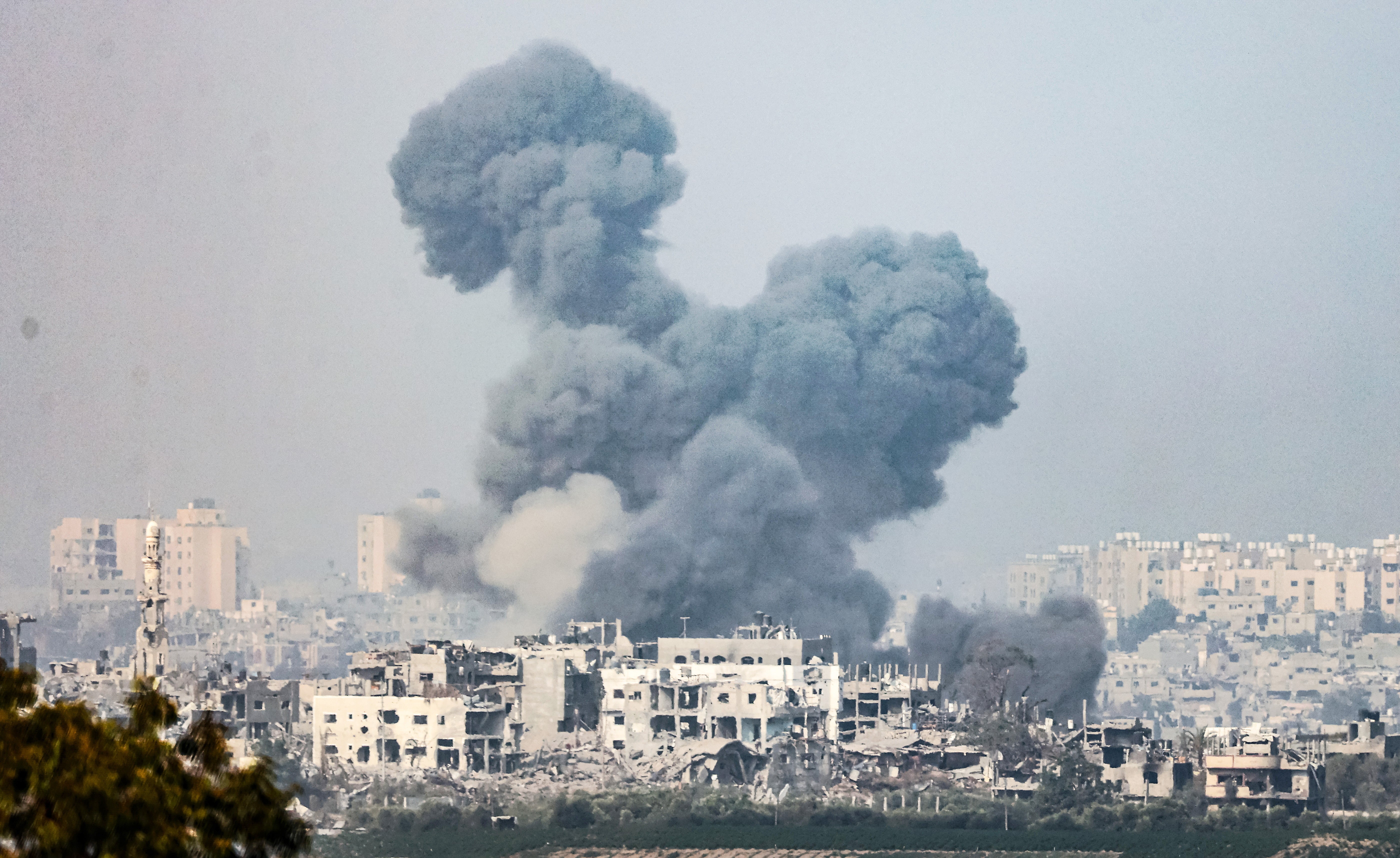 Smoke rises from the northern part of the Gaza Strip as a result of an Israeli airstrike on Saturday morning