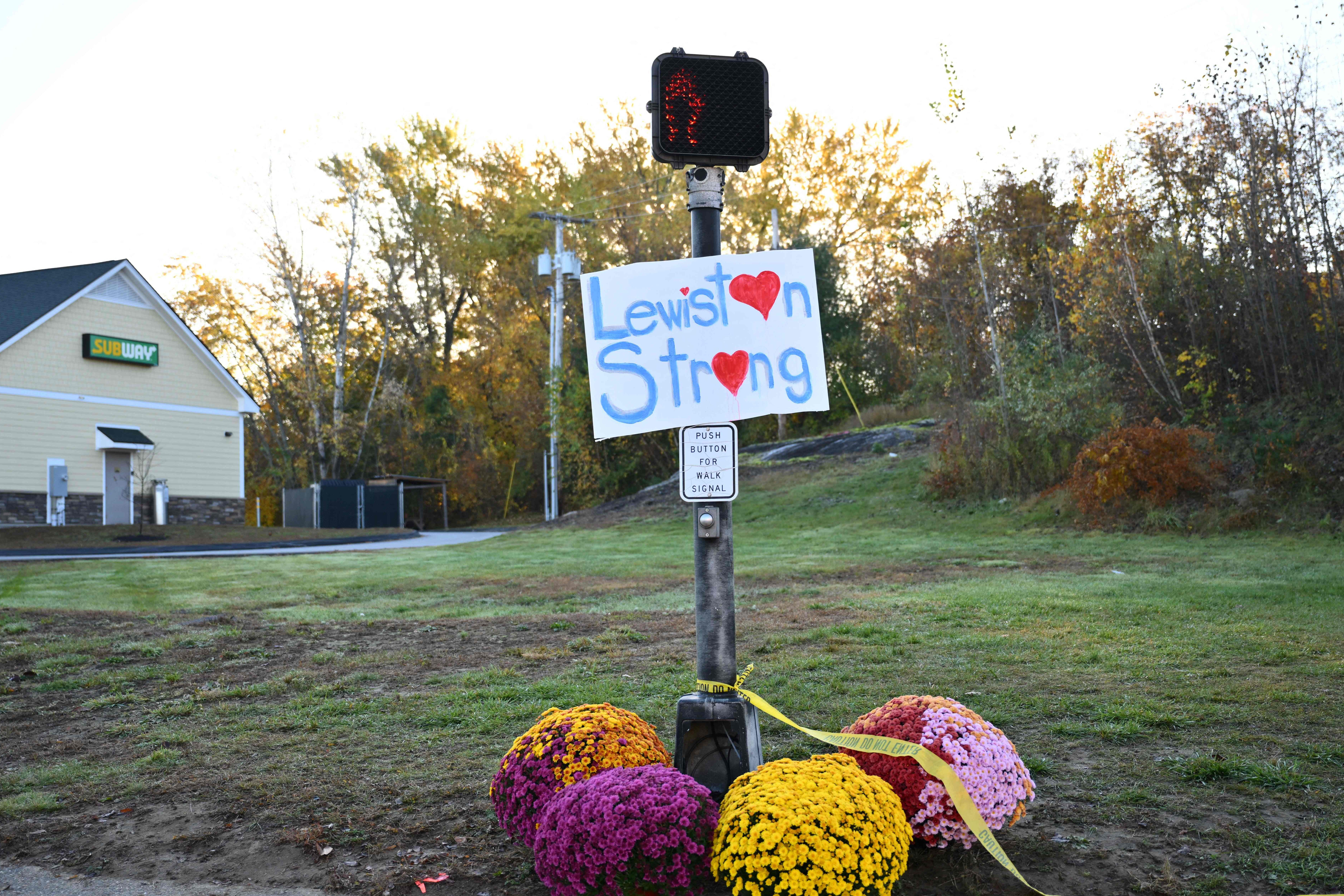 A sign reading ‘Lewiston Strong’ stands in the Maine community scarred by America’s latest mass shooting