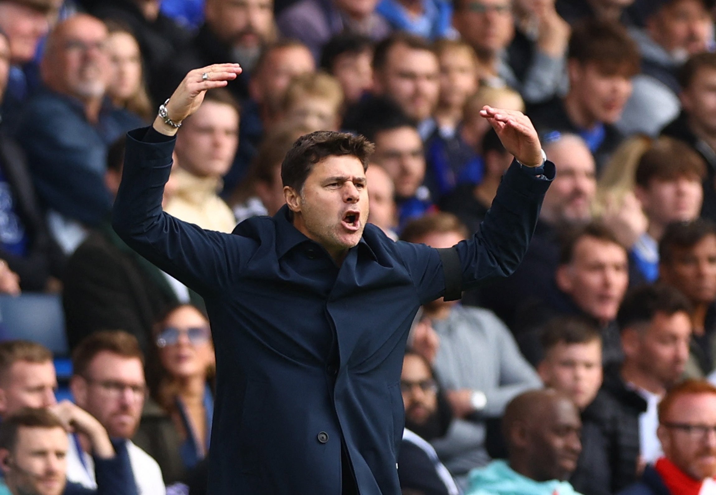 Mauricio Pochettino directs from the touchline at Stamford Bridge