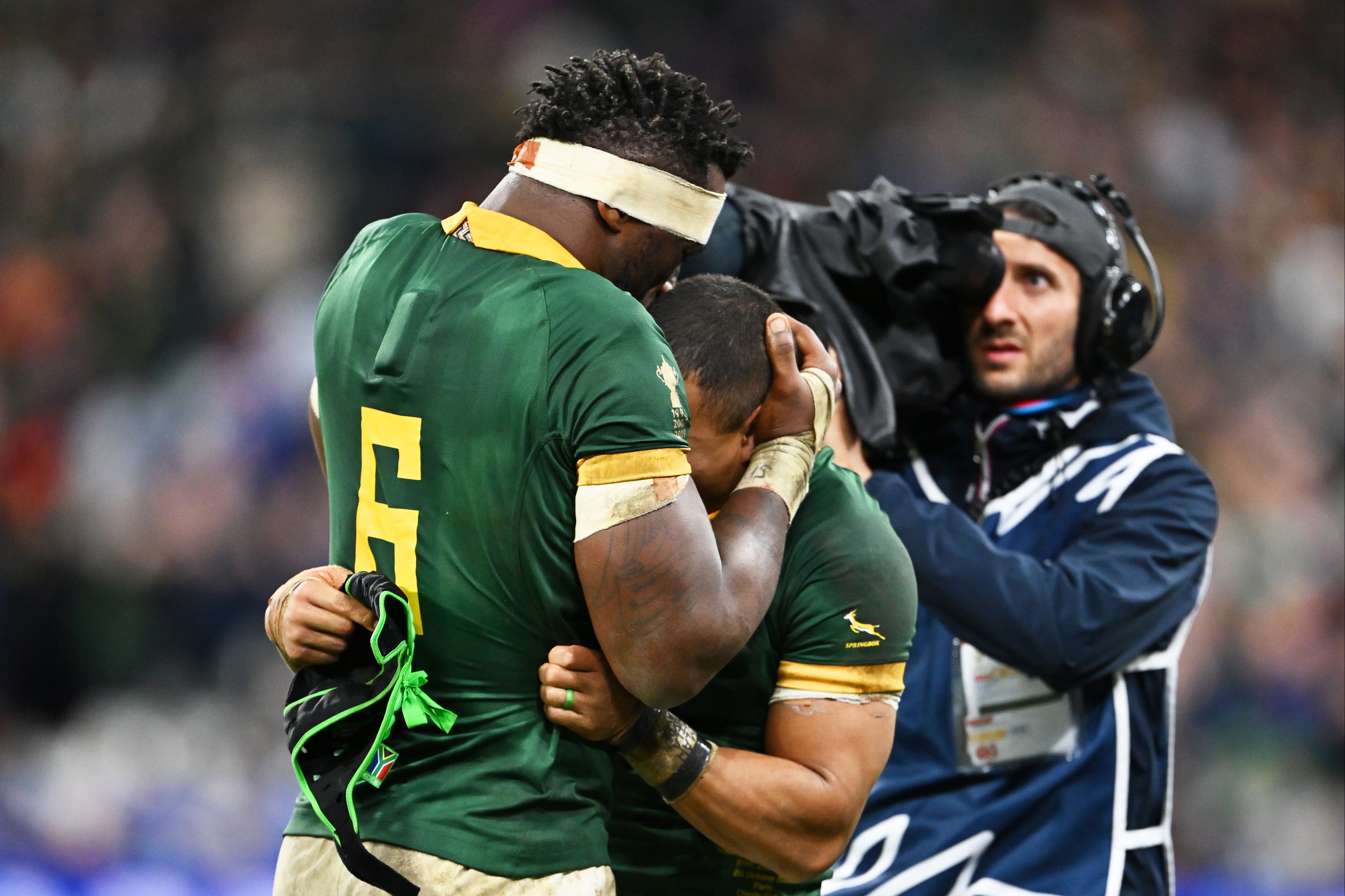 Siya Kolisi embraces Kurt-Lee Arendse at full-time