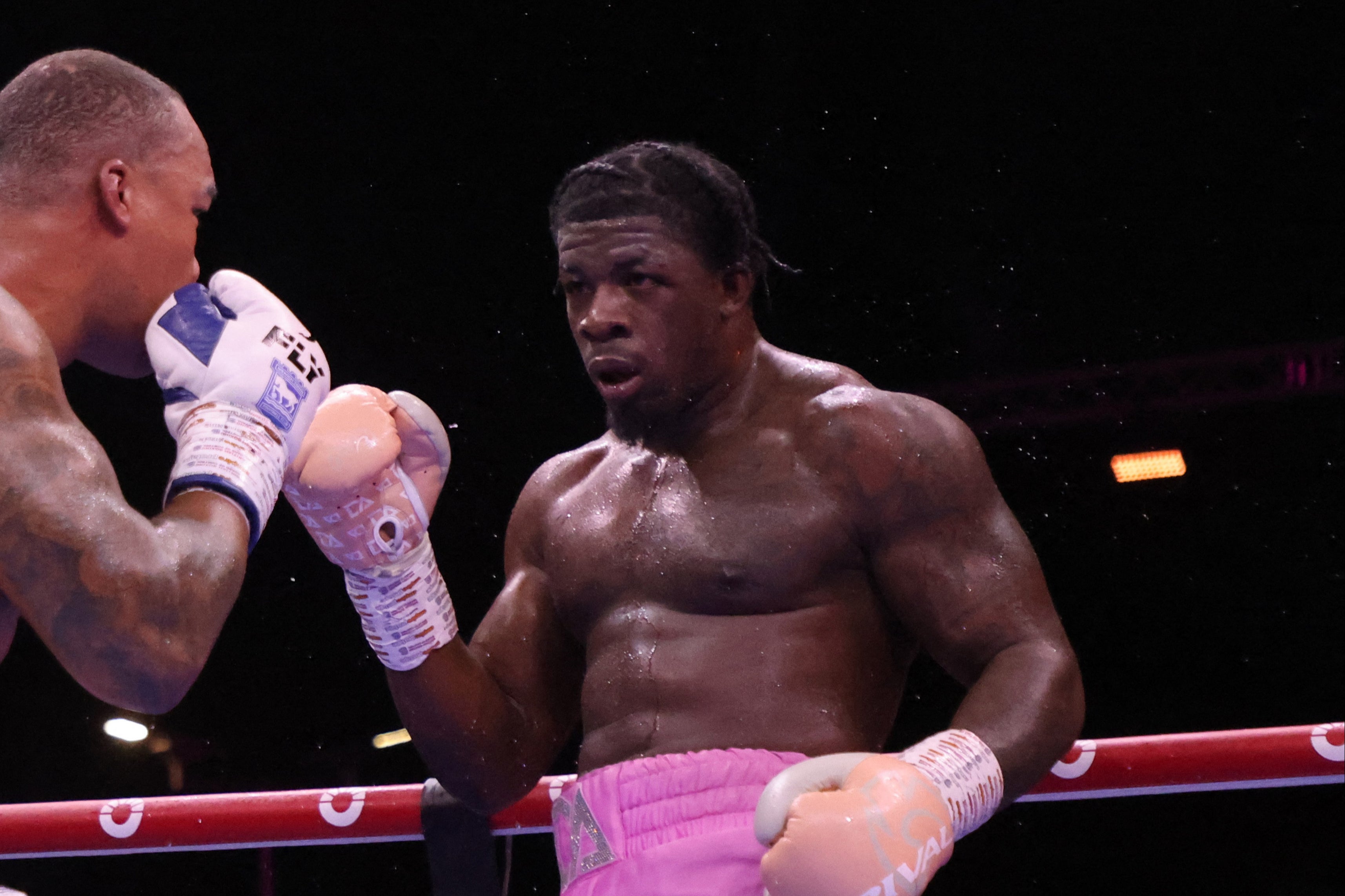 Fabio Wardley in action with David Adeleye during their heavyweight fight