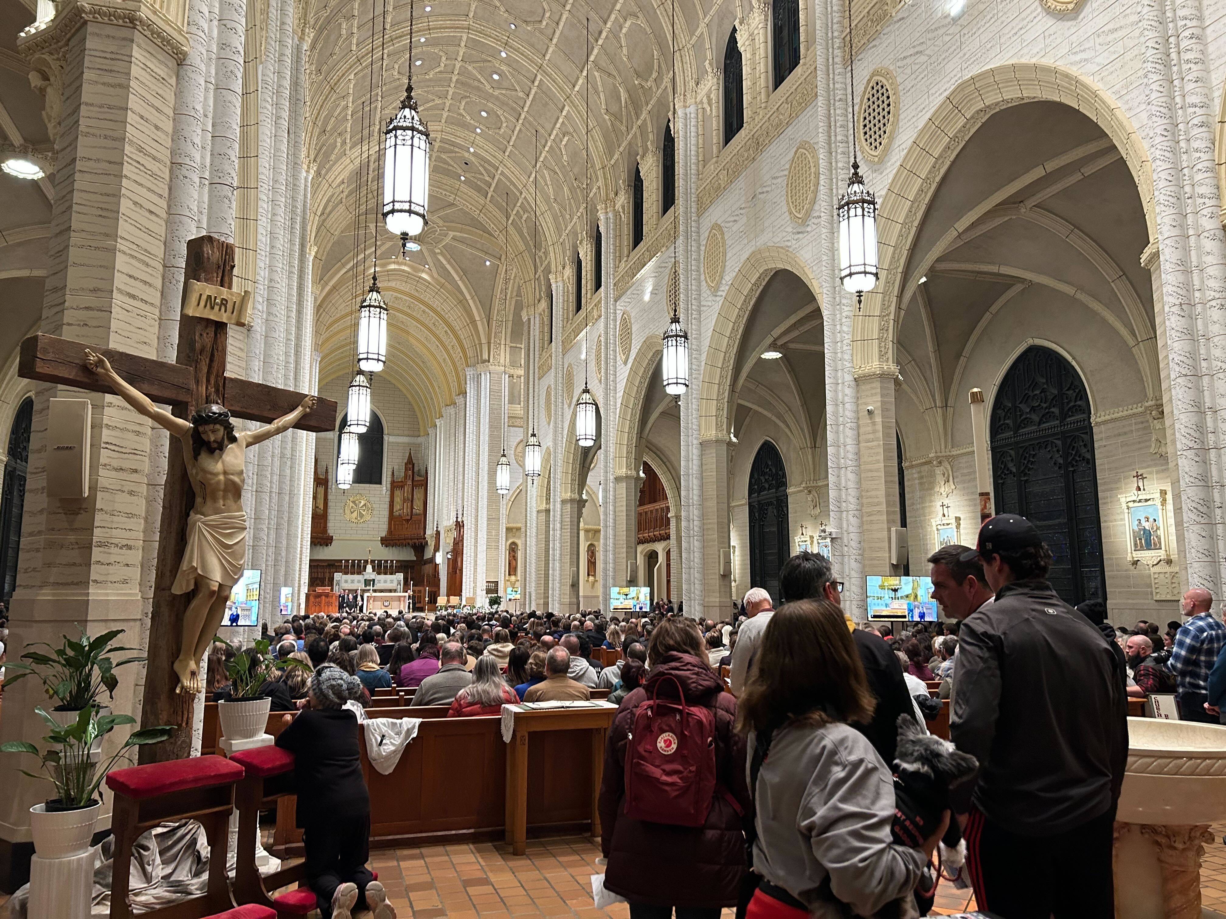 Inside the basilica during Lewiston’s first major vigil for the shooting victims