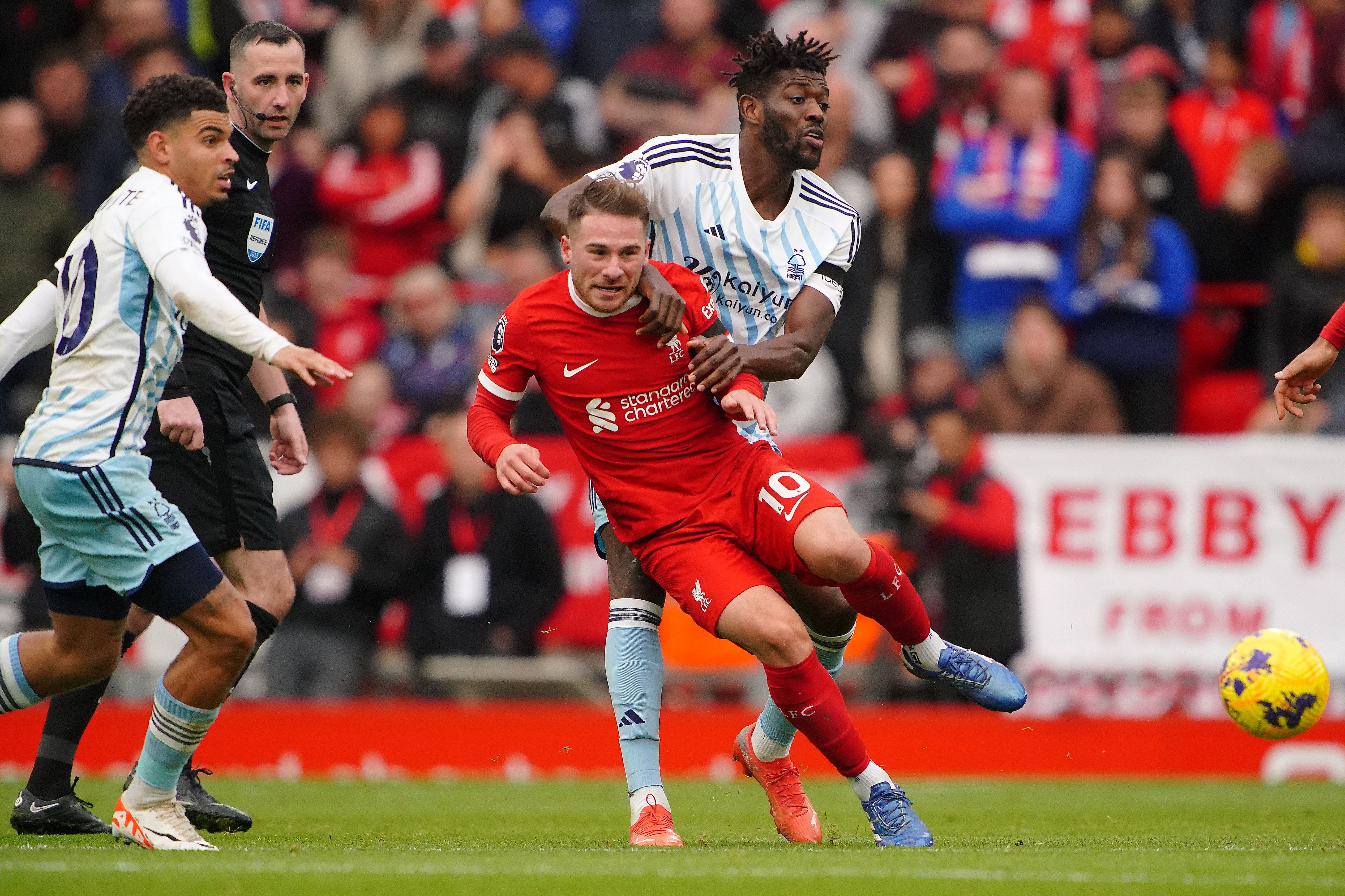 Alexis Mac Allister, centre, is thriving in a deeper midfield role for Liverpool (Peter Byrne/PA)