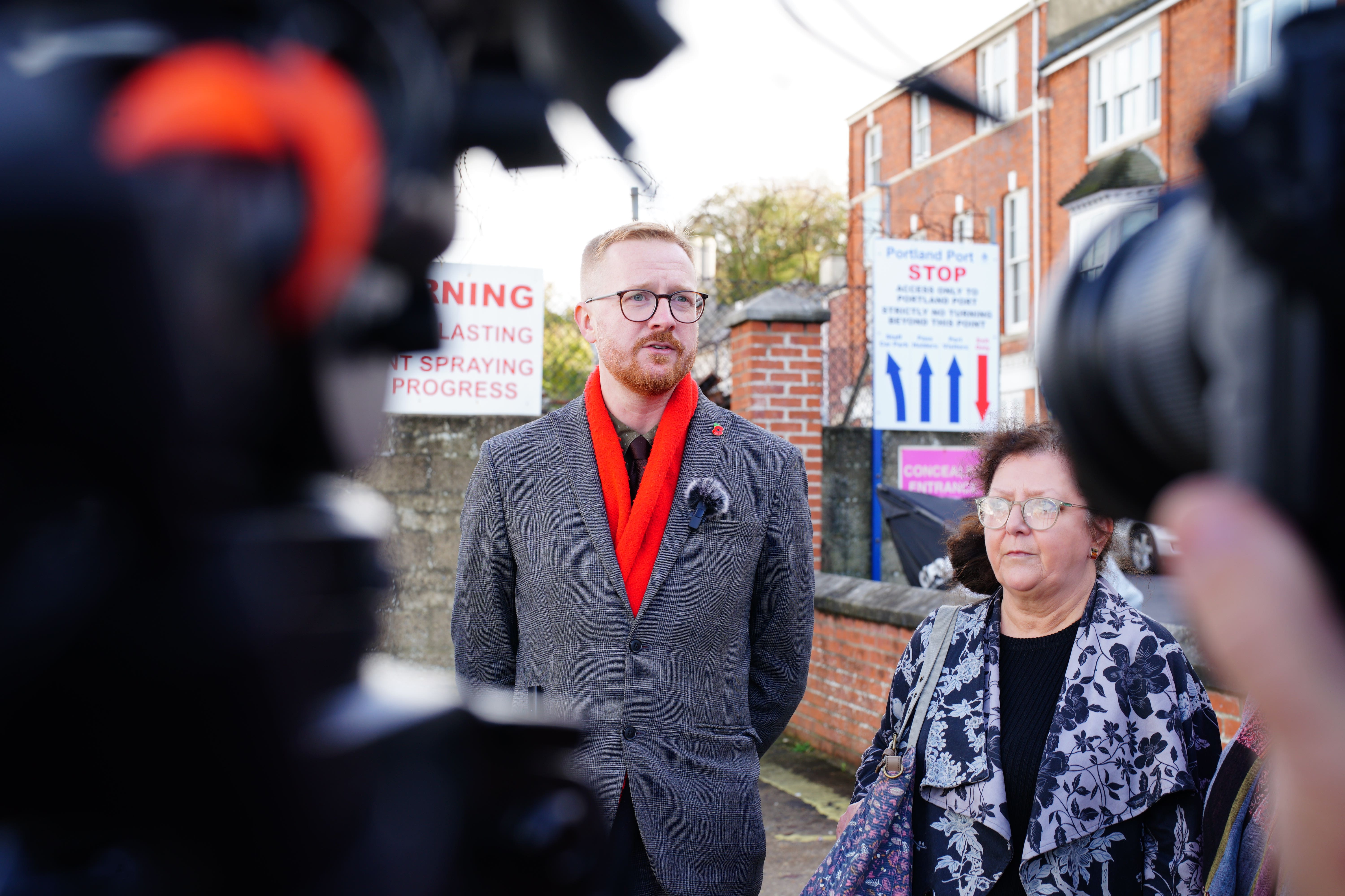 Lloyd Russell-Moyle (centre), the Labour MP for Brighton Kemptown, speaks to the media after requesting access to the Bibby Stockholm accommodation barge at Portland Port in Dorset. Mr Russell-Moyle has said he had been denied access to the barge itself, after Home Secretary Suella Braverman did not respond to a letter from several Labour MPs requesting access, sent earlier this month. Picture date: Monday October 30, 2023.