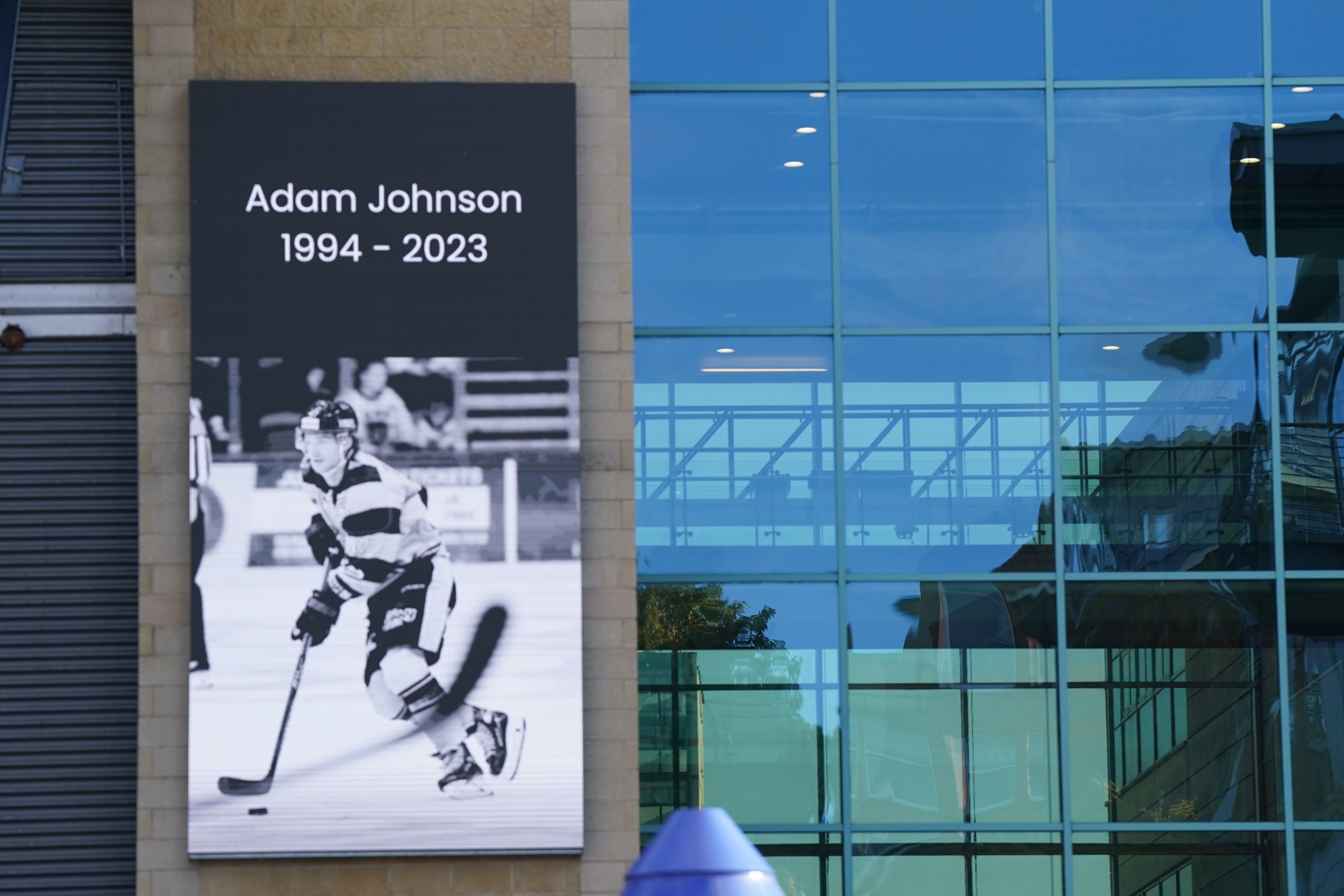 Tributes have been paid outside the Motorpoint Arena in Nottingham following the death of Panthers player Adam Johnson