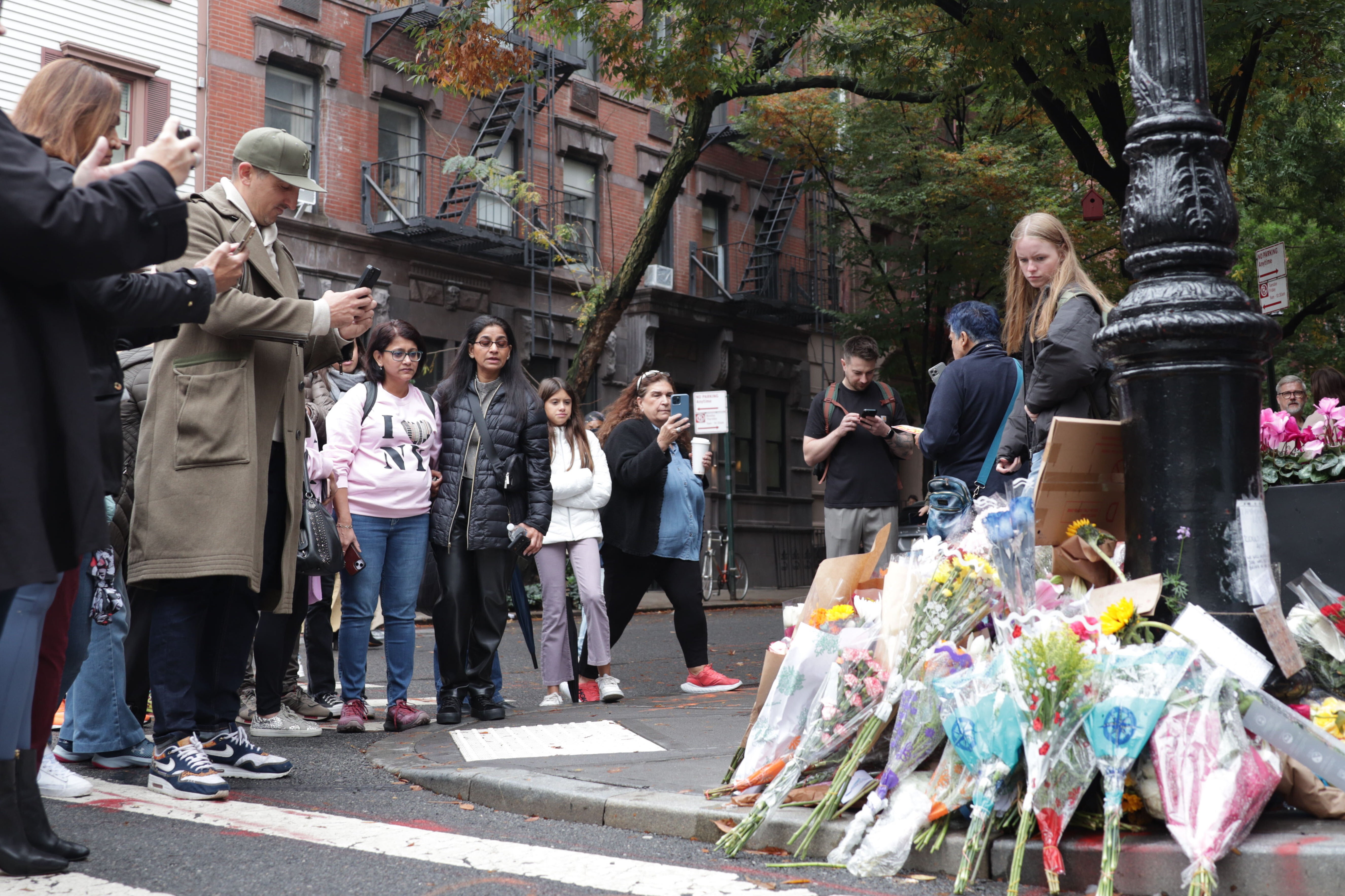 Fans gather outside the ‘Friends’ building in NYC