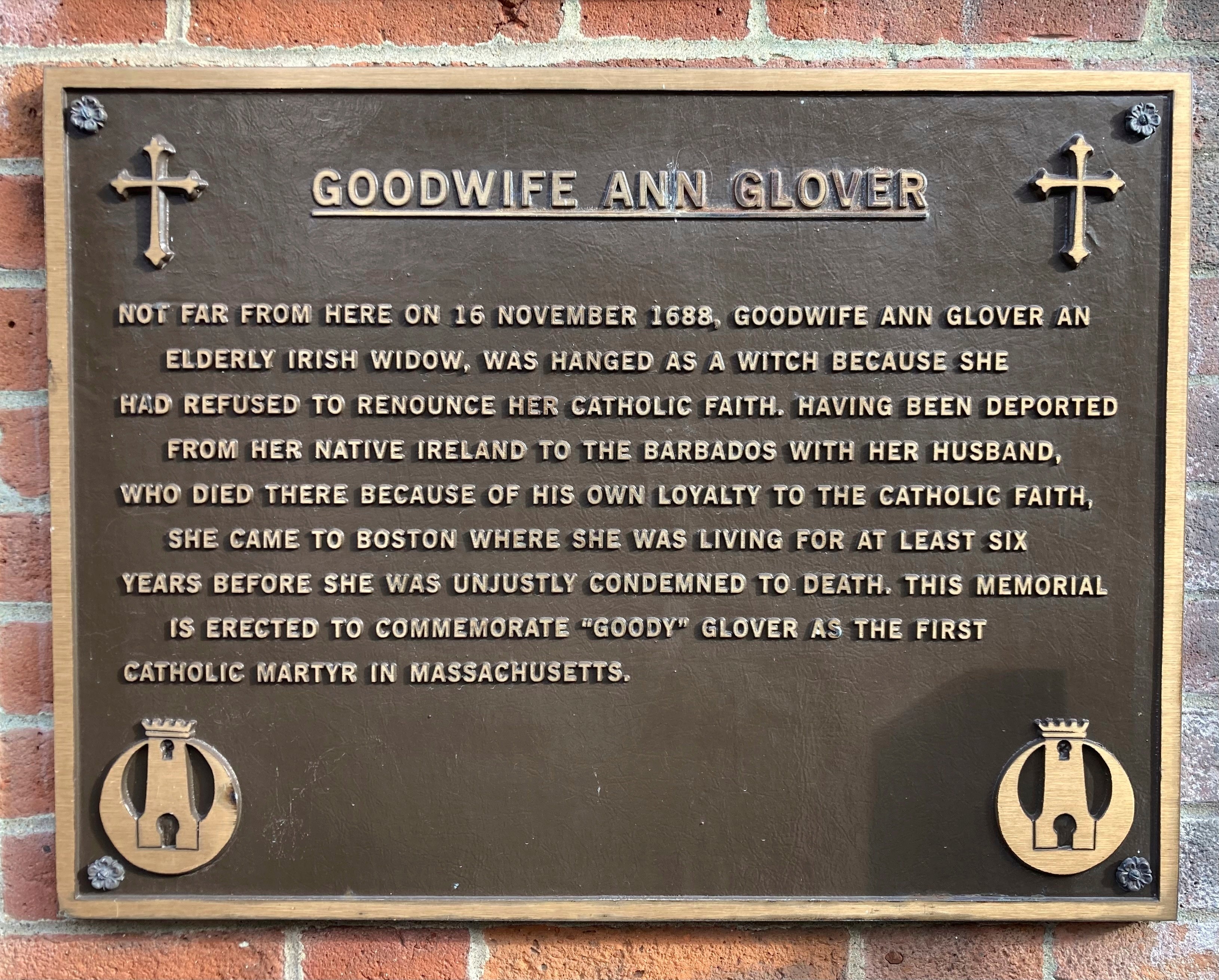 A plaque memorializing Goodwife Ann Glover or Goody Glover, hanged as a witch in Boston in 1688, is located on the front of a Catholic church in the city's North End neighborhood