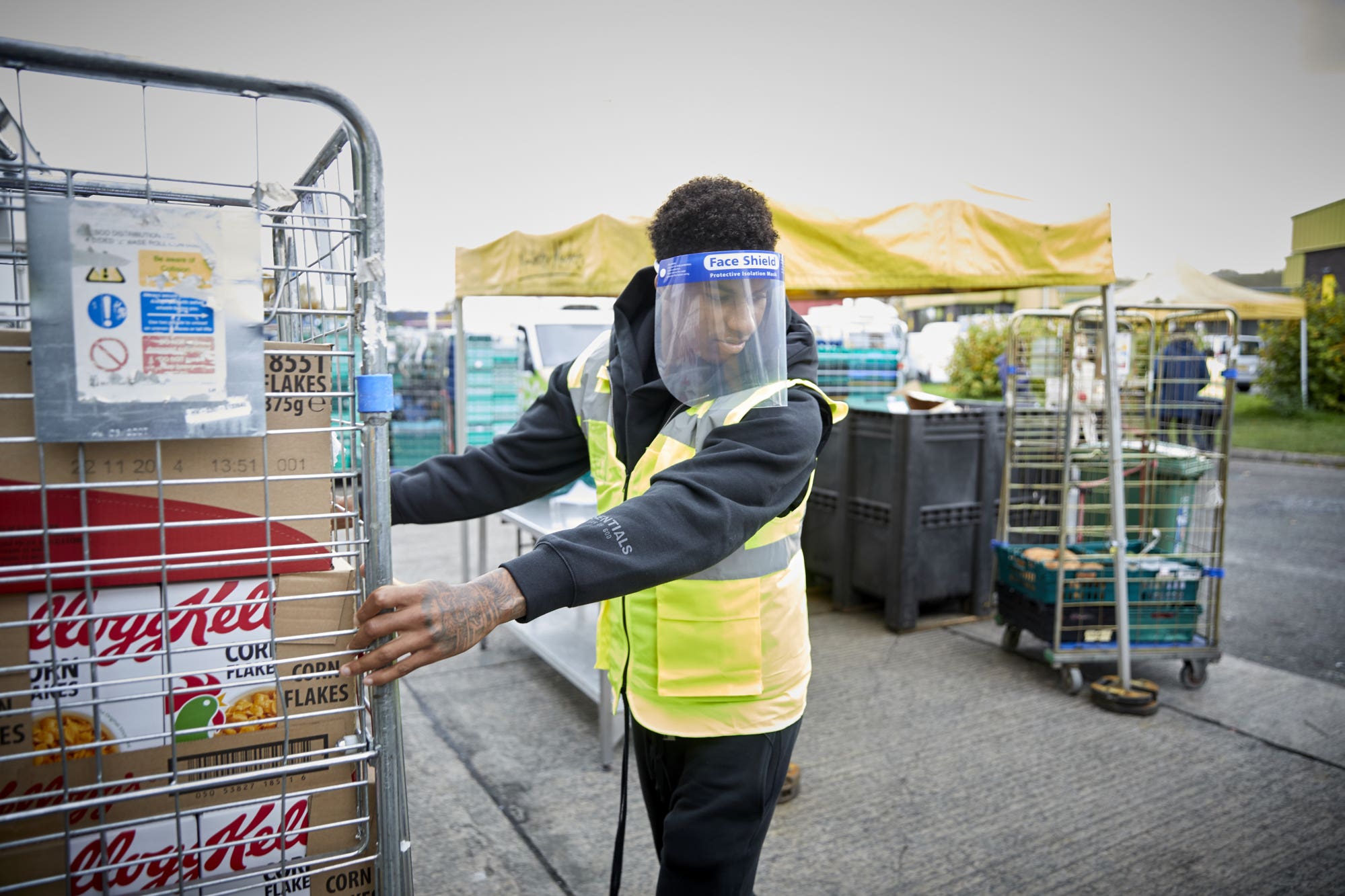 England football star Marcus Rashford led a campaign for free school meal vouchers in the pandemic (Fareshare/Mark Waugh/PA)