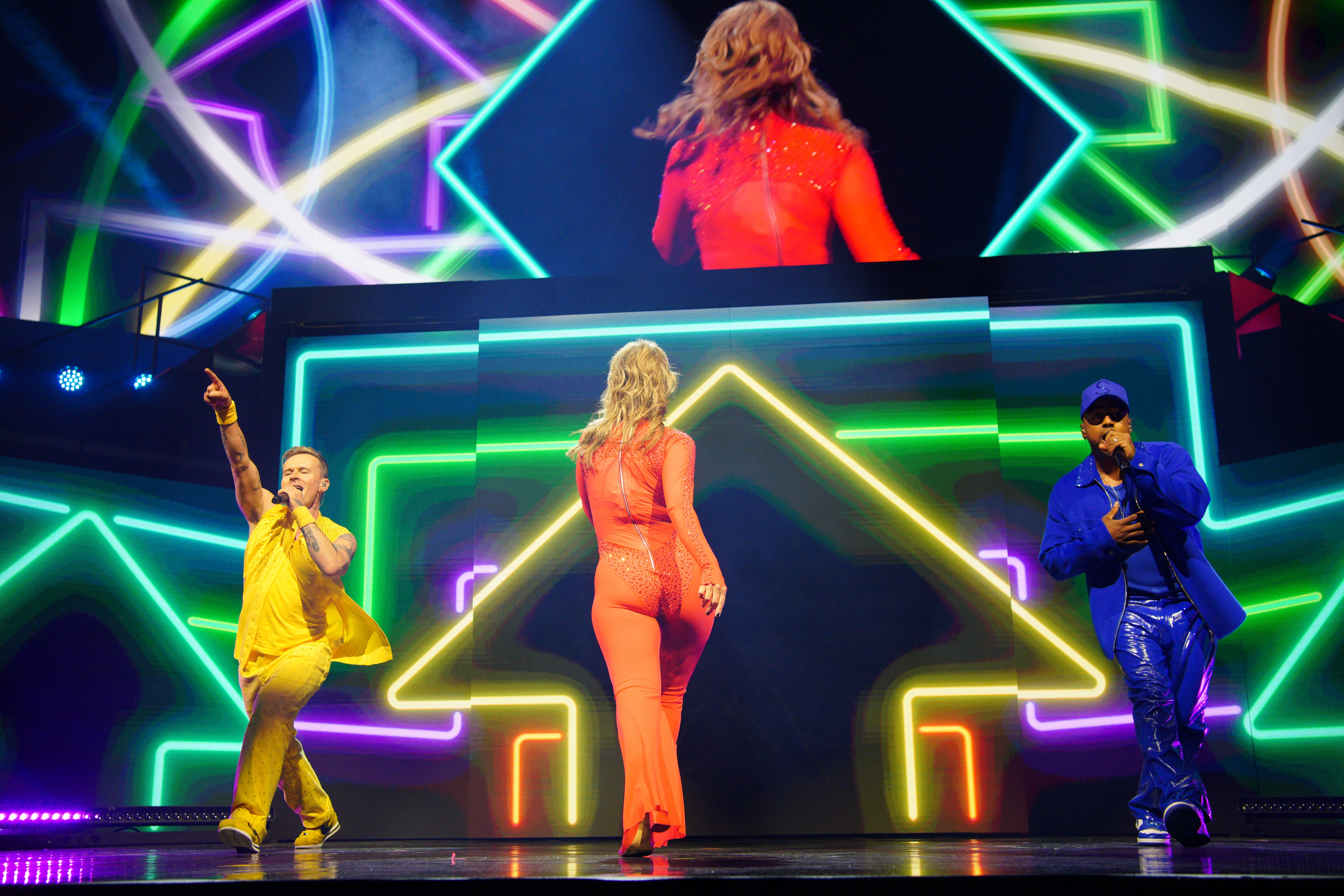 (l to r) Jon Lee, Rachel Stevens and Bradley McIntosh of S Club perform on stage earlier this month (Peter Byrne/PA)