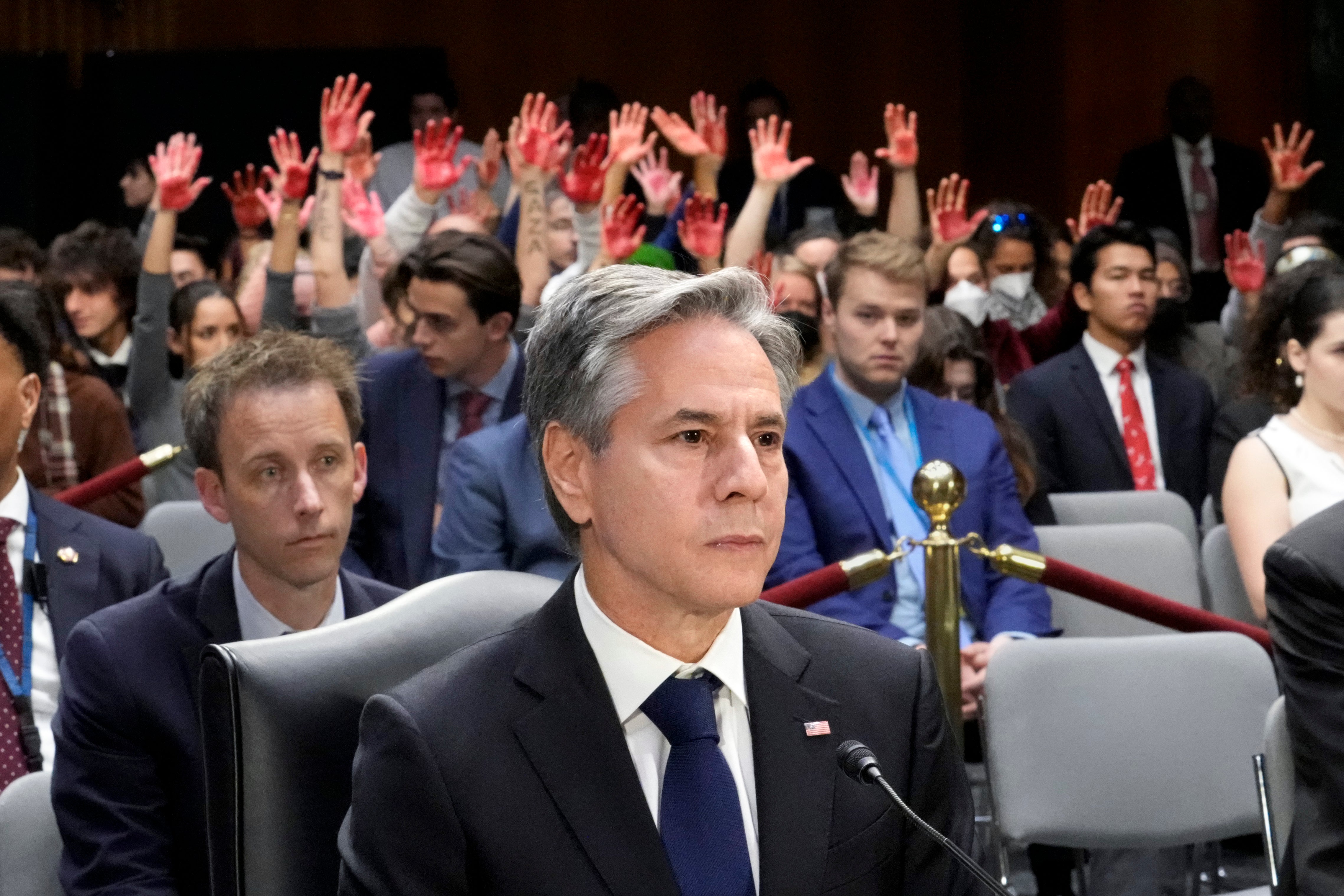 Secretary of State Antony Blinken pauses as his testimony to the Senate Appropriations Committee to aid to Israel and Ukraine is overwhelmed by shouts from protesters in the audience, at the Capitol in Washington, Tuesday, Oct. 31, 2023.