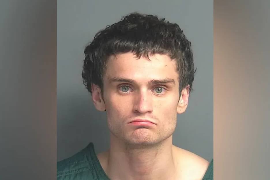 Miles Joseph Fridrich, 24, was arrested near the crime scene on a first-degree murder charge over the killing of Khan.