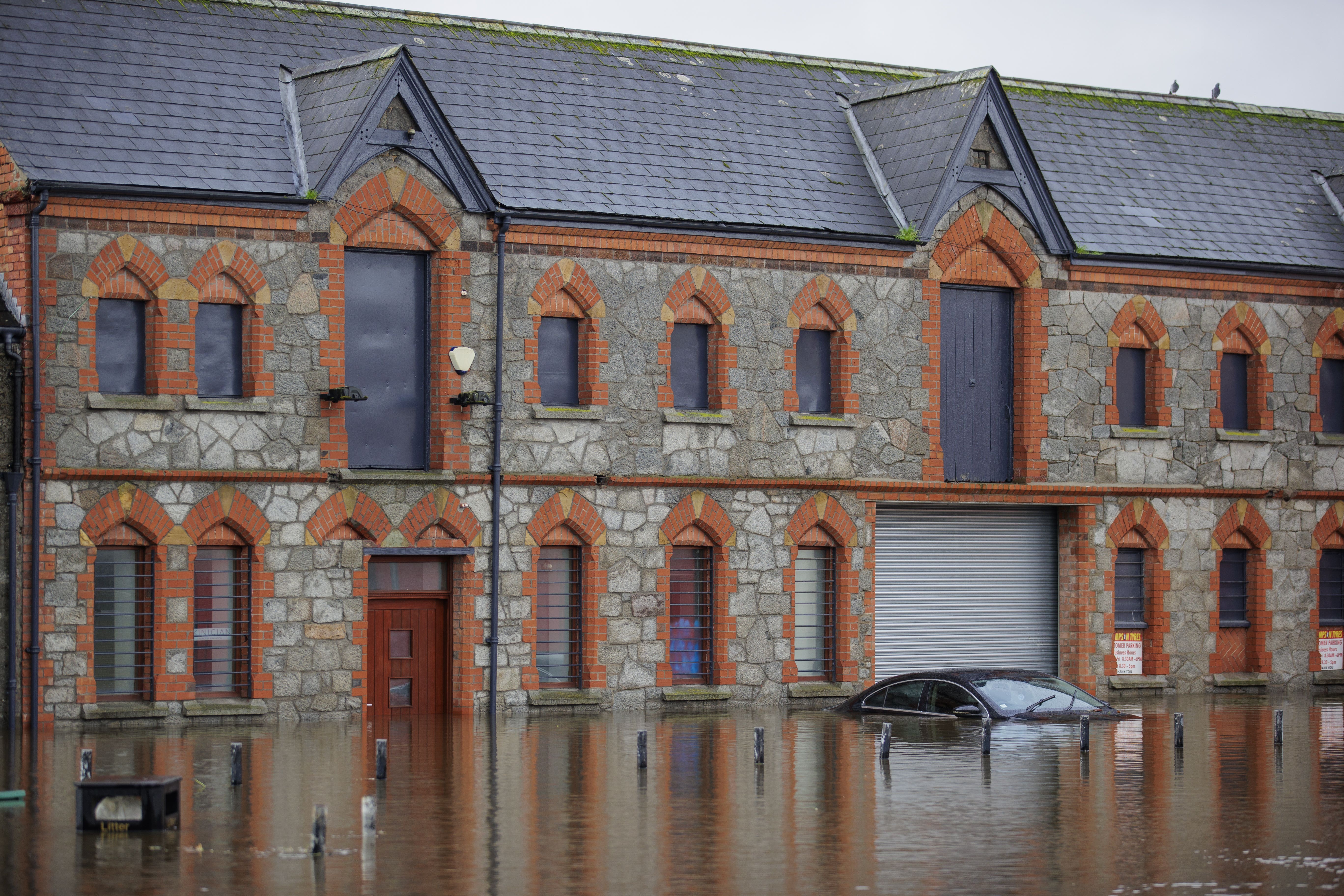 A car submerged in floodwater at Basin Walk Car Park in Newry, Co Down on Tuesday (Liam McBurney/PA)