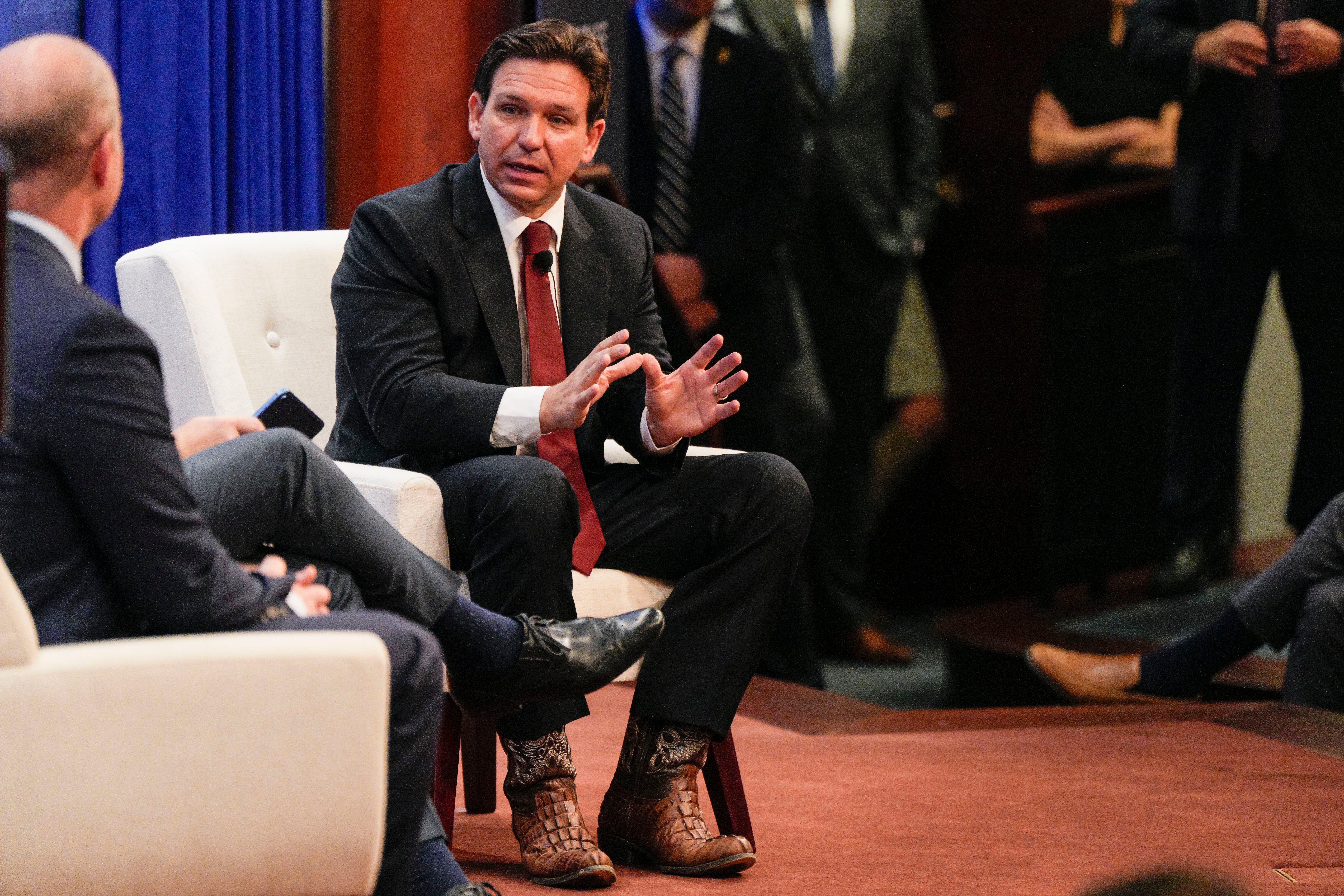 Ron DeSantis sports some cowboy boots at a Hertiage Foundation talk on Friday