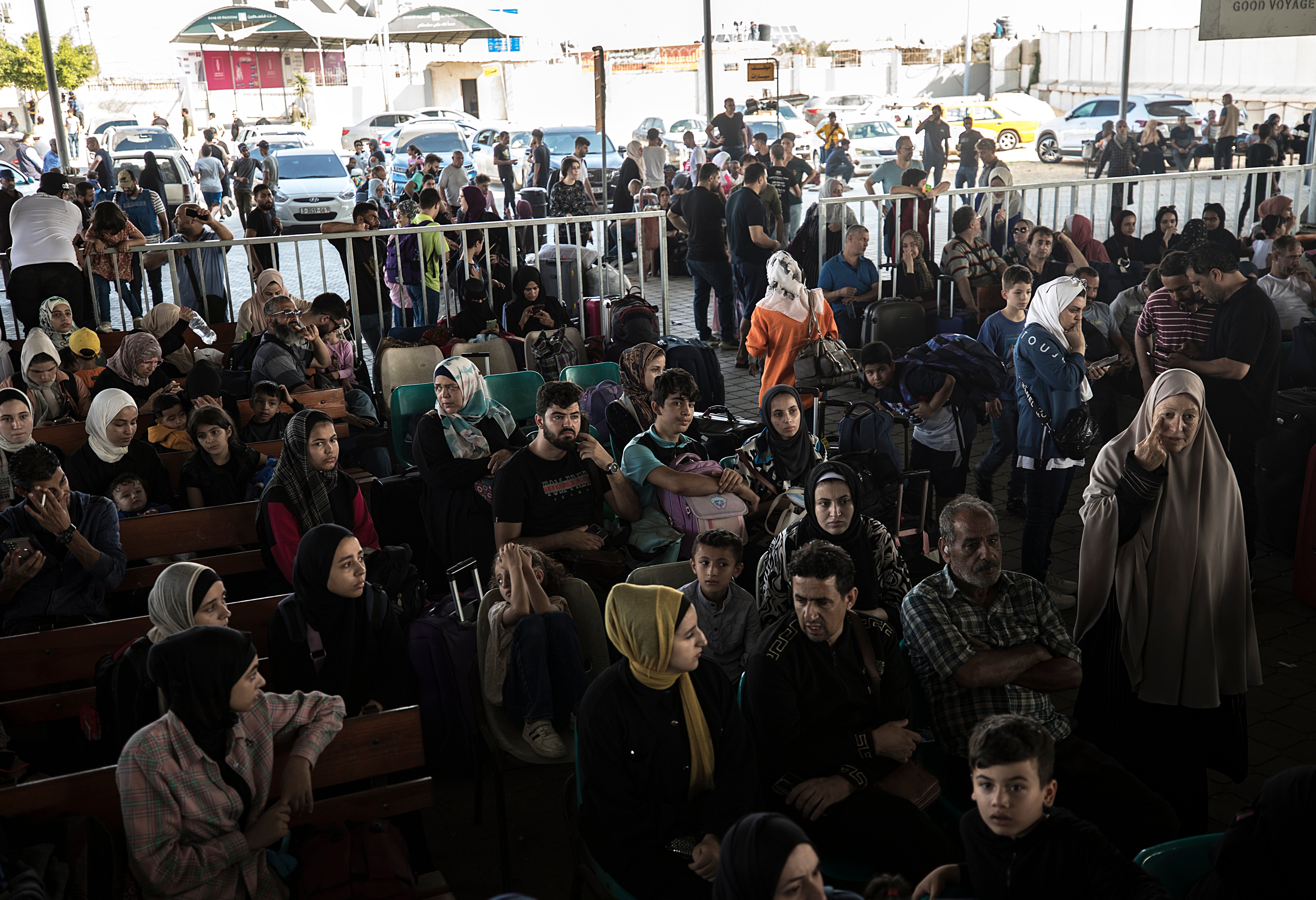 Some foreign nationals were allowed through this morning, while many Palestinians waited