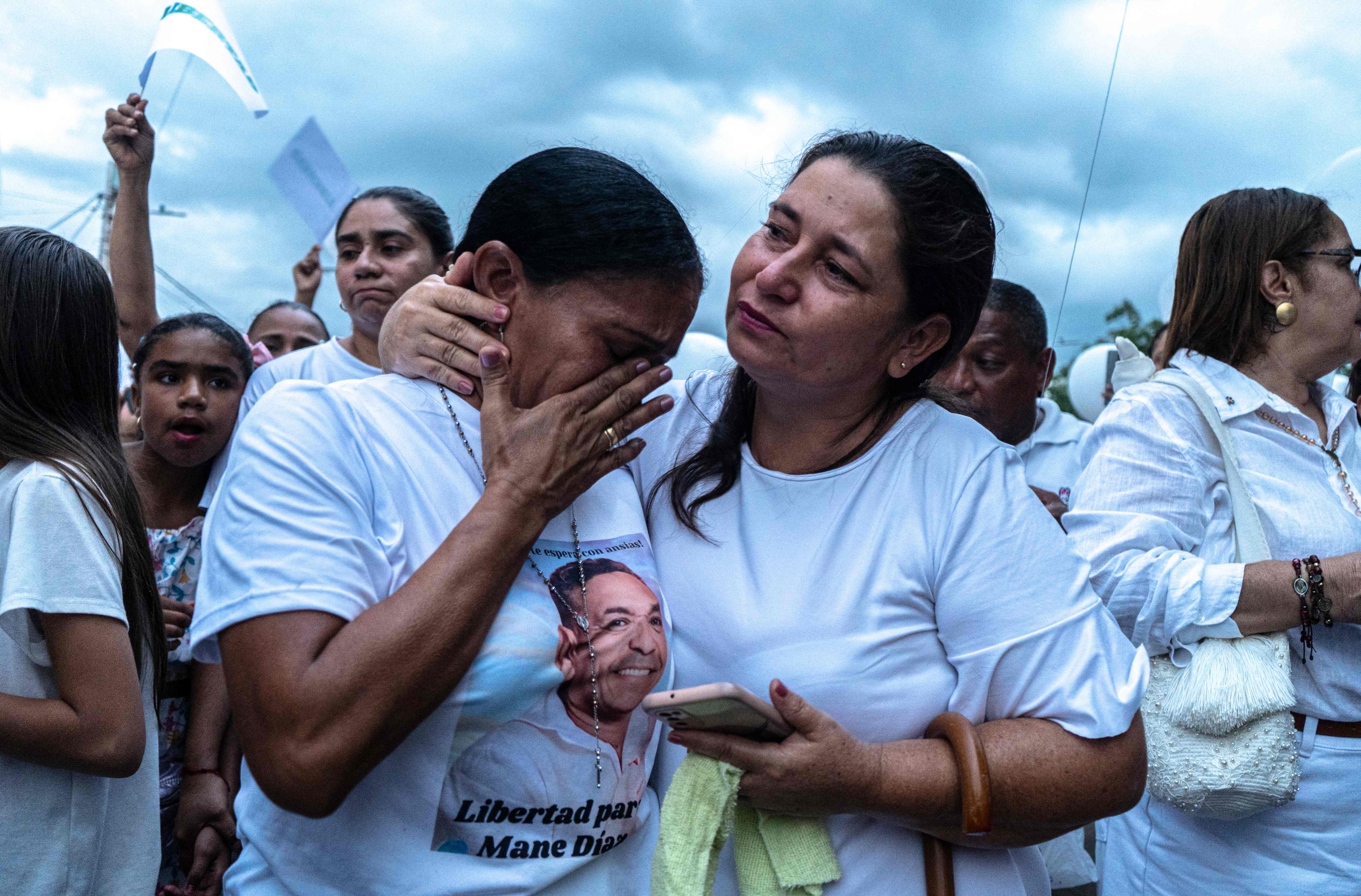 Cilenis Marulanda (left), mother of Diaz, takes part in the march for her kidnapped husband