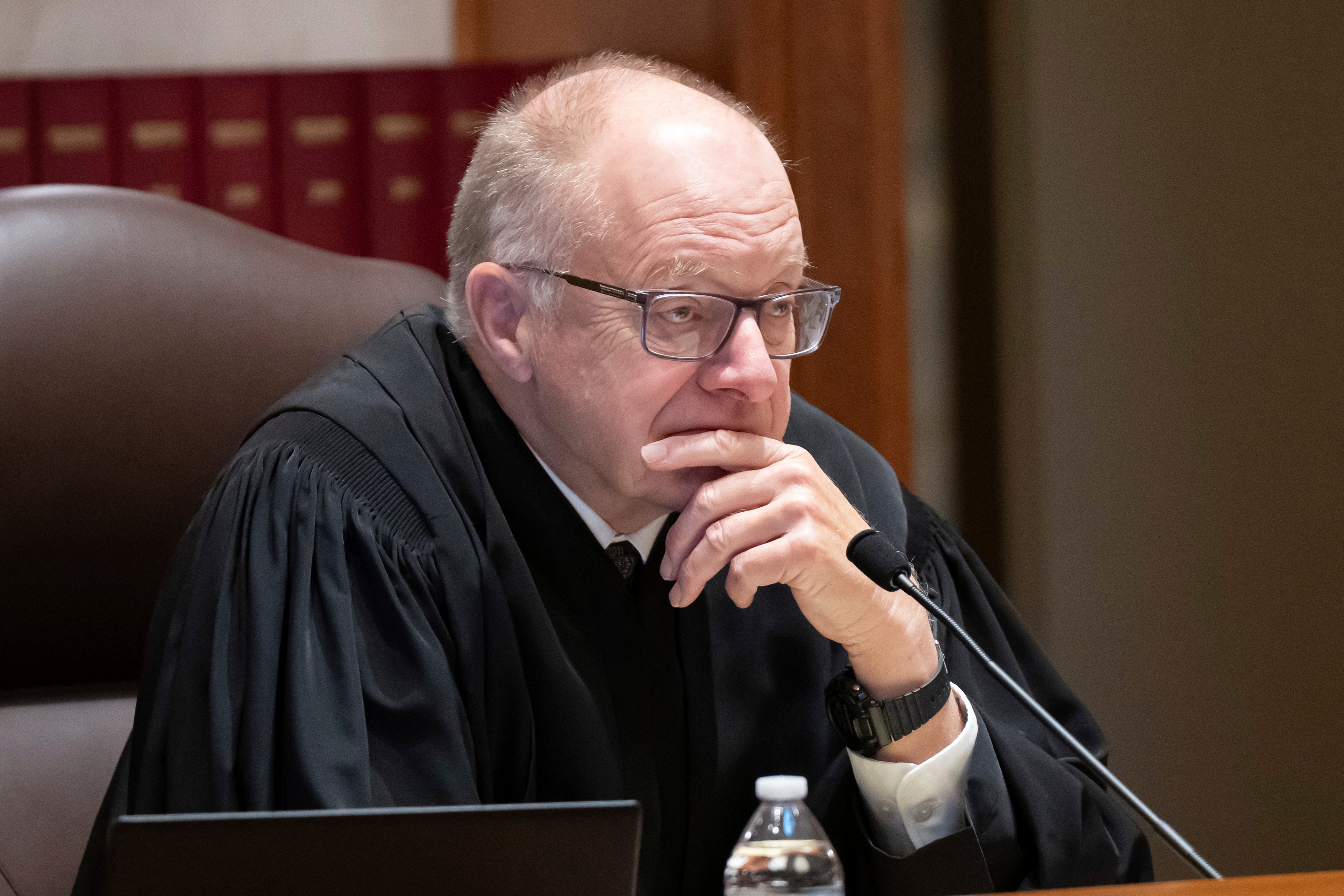 Associate Justice Barry Anderson listens as Donald Trump's attorney Nicholas Nelson argues his case before the Minnesota Supreme Court