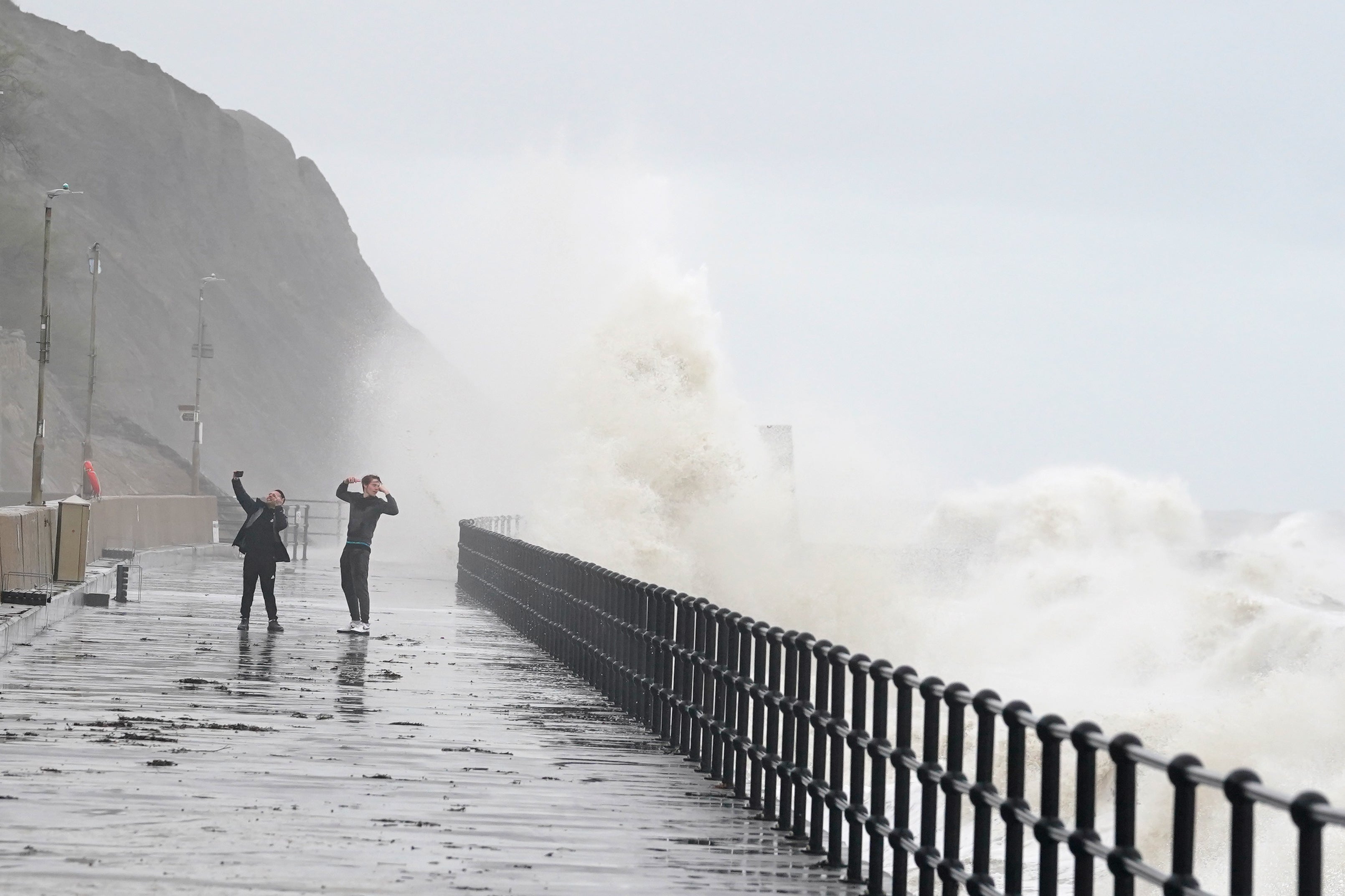 Waves crash over the promenade in Folkestone, Kent during Storm Ciaran in November