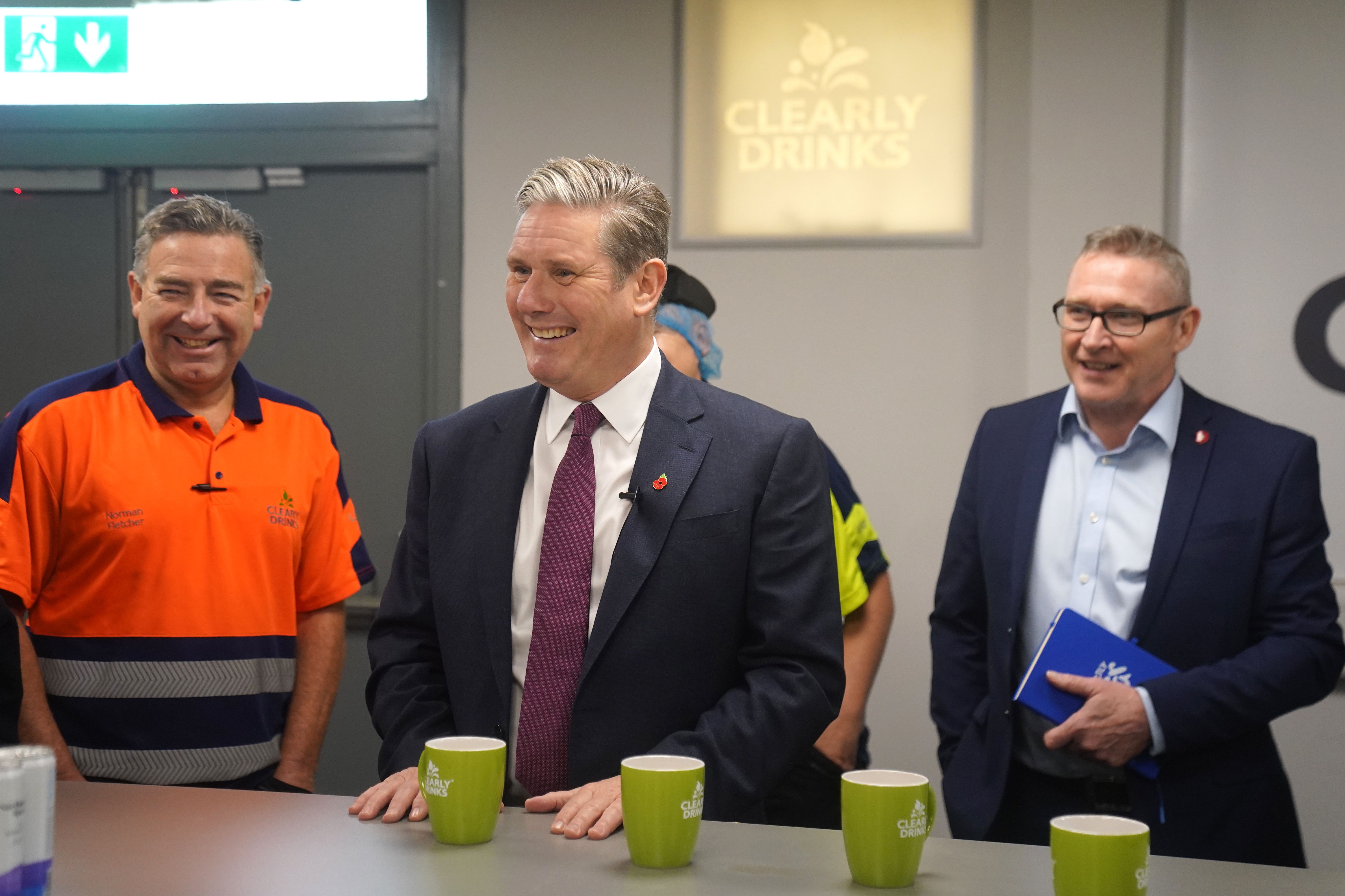 Sir Keir Starmer visits soft drinks manufacturer Clearly Drinks in Sunderland (Owen Humphreys/PA)