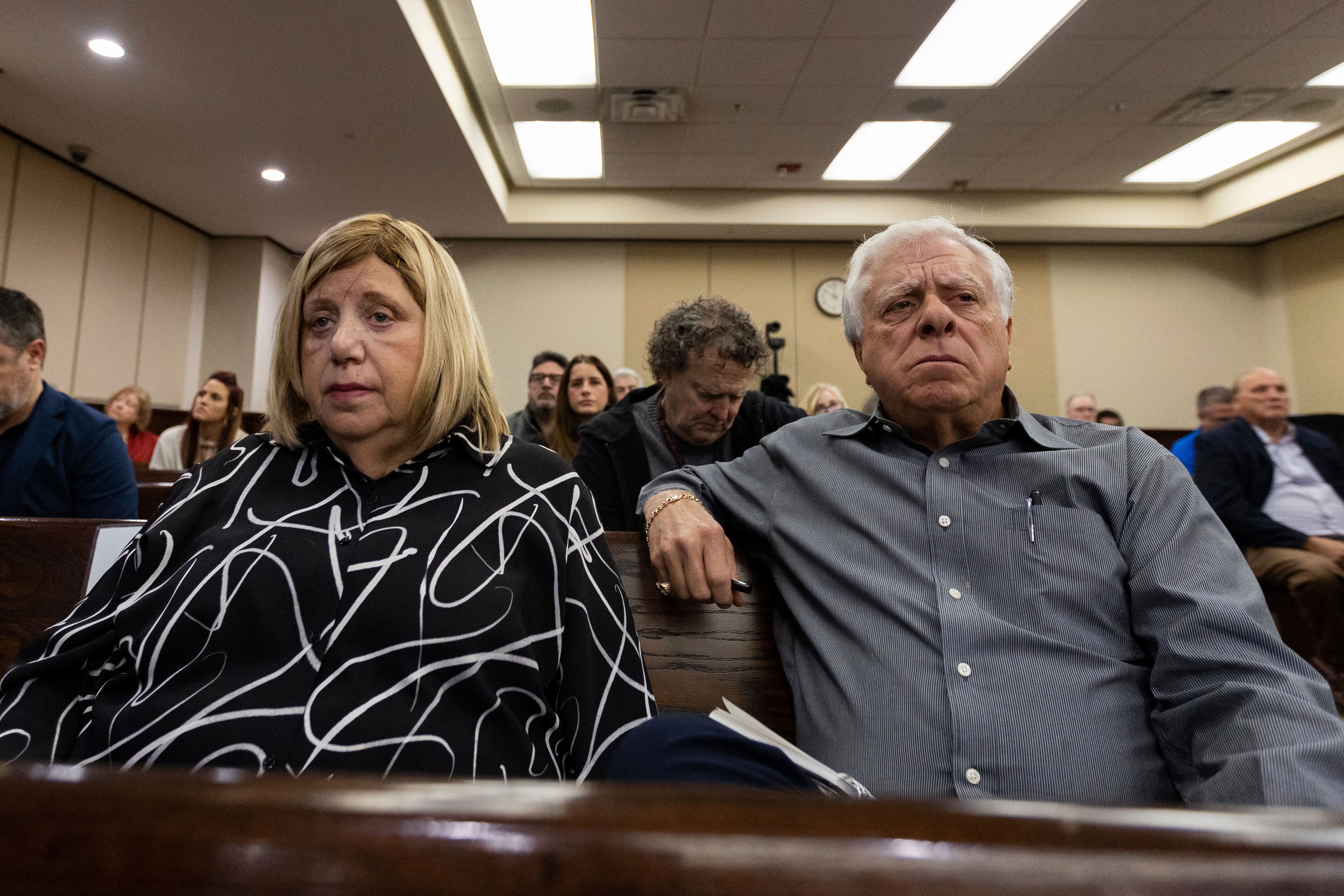 Ruth and Phil Markel listen as Charlie Adelson is cross examined by Assistant State Attorney Georgia Cappleman last month