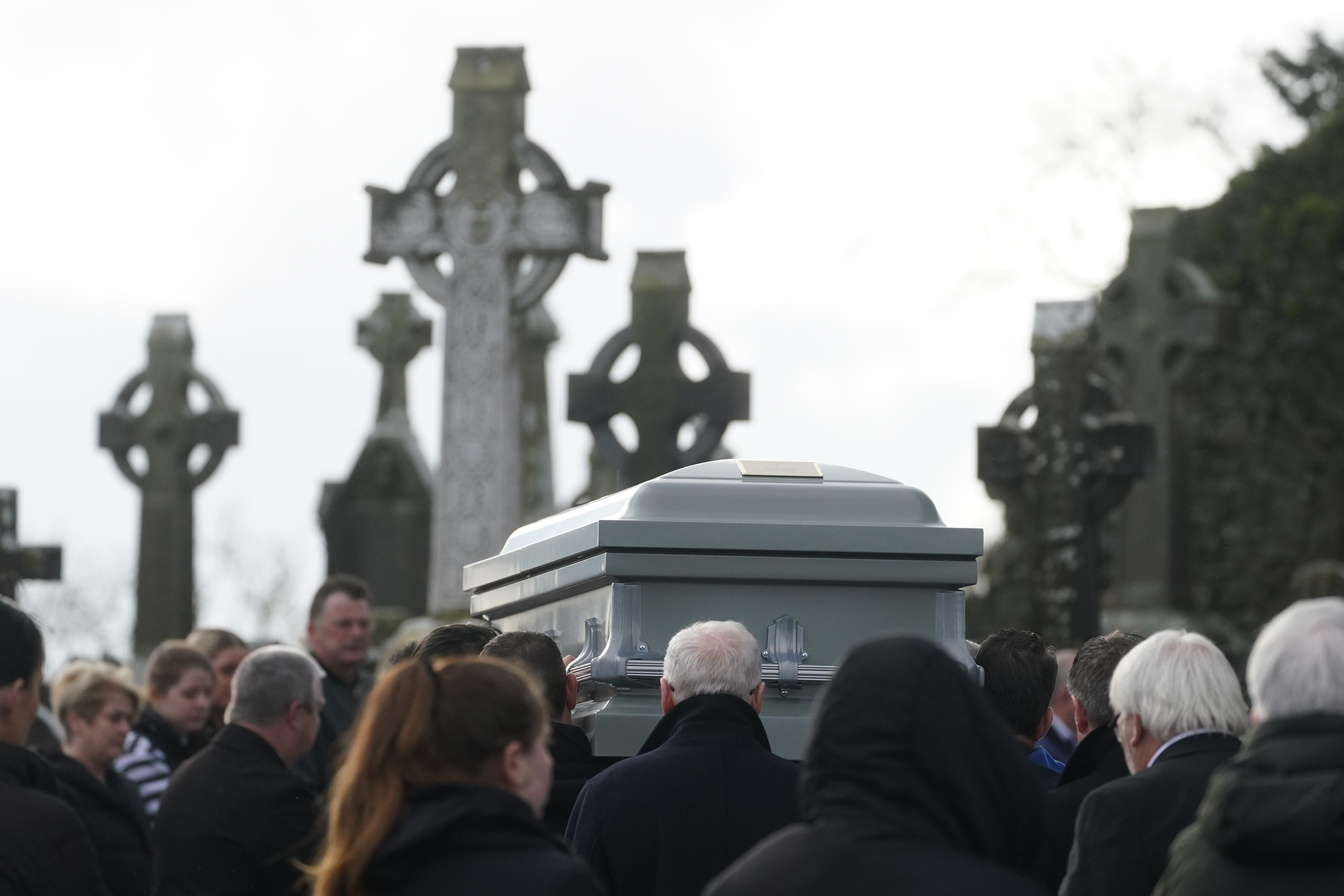 The coffin of Denise Morgan is carried out of the Church of the Assumption in Tullyallen (Brian Lawless/PA)