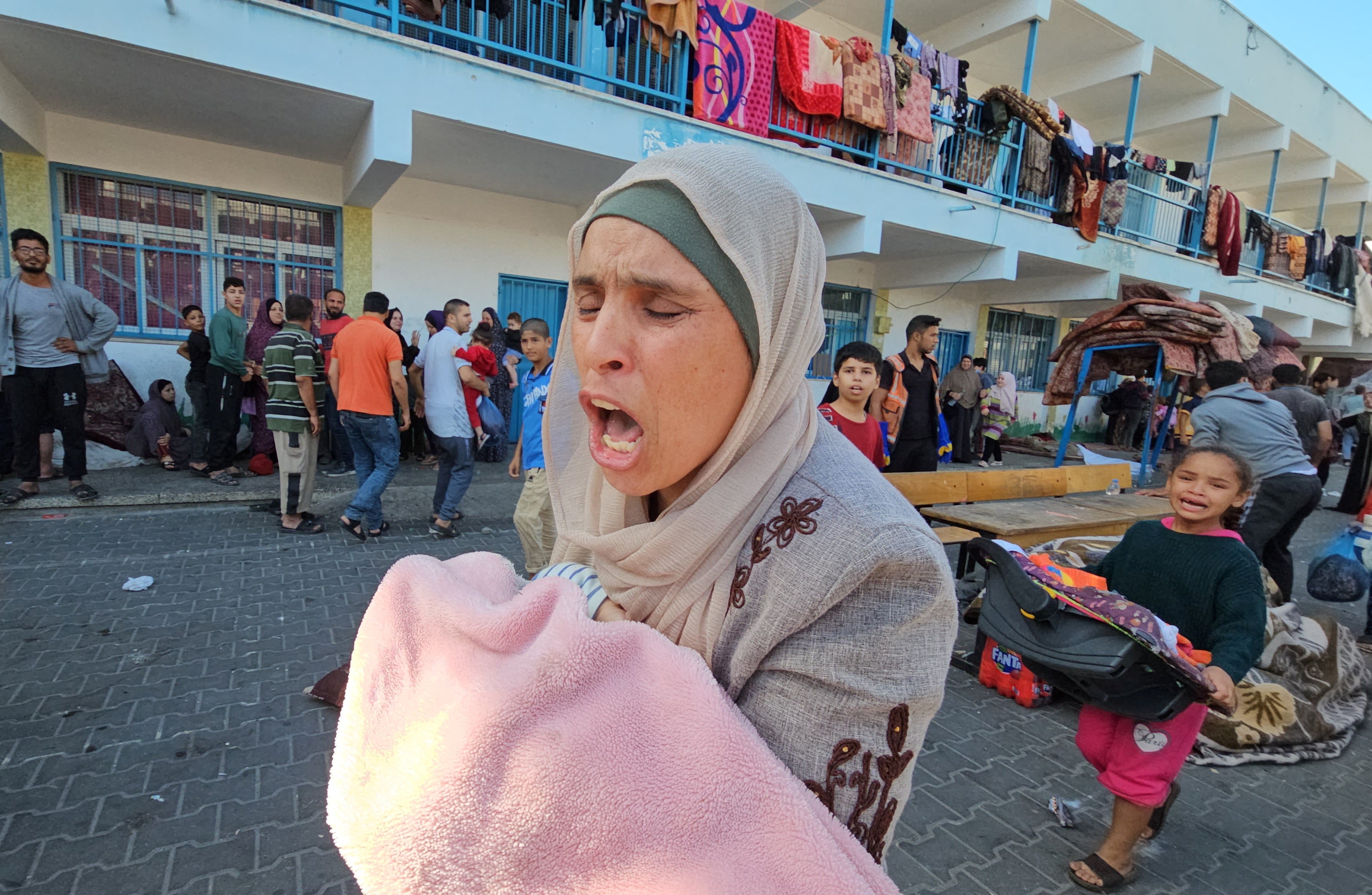 An Israeli airstrike at a UN-run school sheltering displaced people