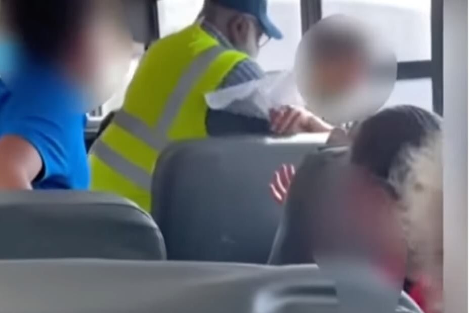 A school bus driver was filmed choking and slapping a student