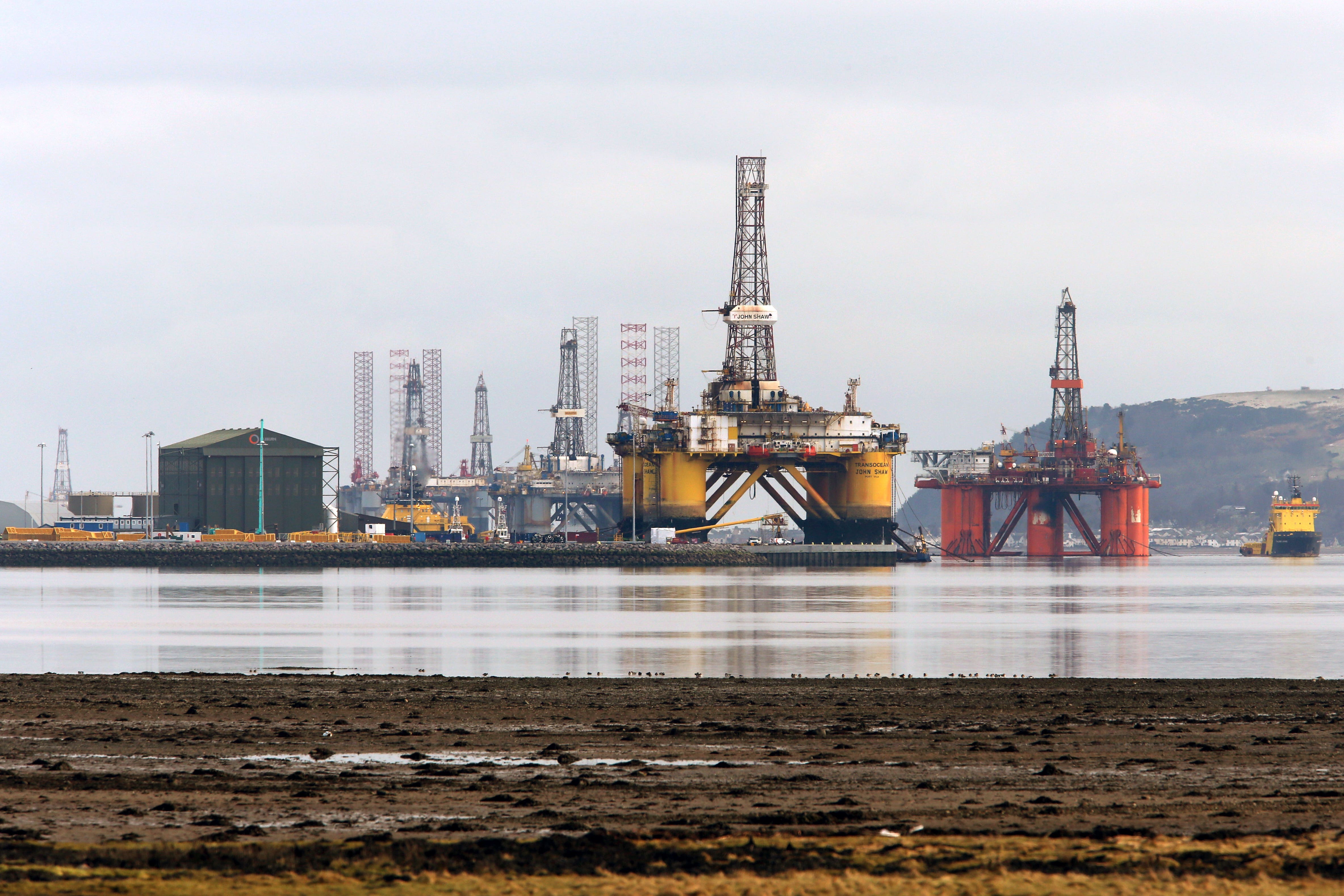 Oil platforms stand amongst other rigs which have been left in the Cromarty Firth near Invergordon in the Highlands of Scotland (Andrew Milligan/PA Wire).