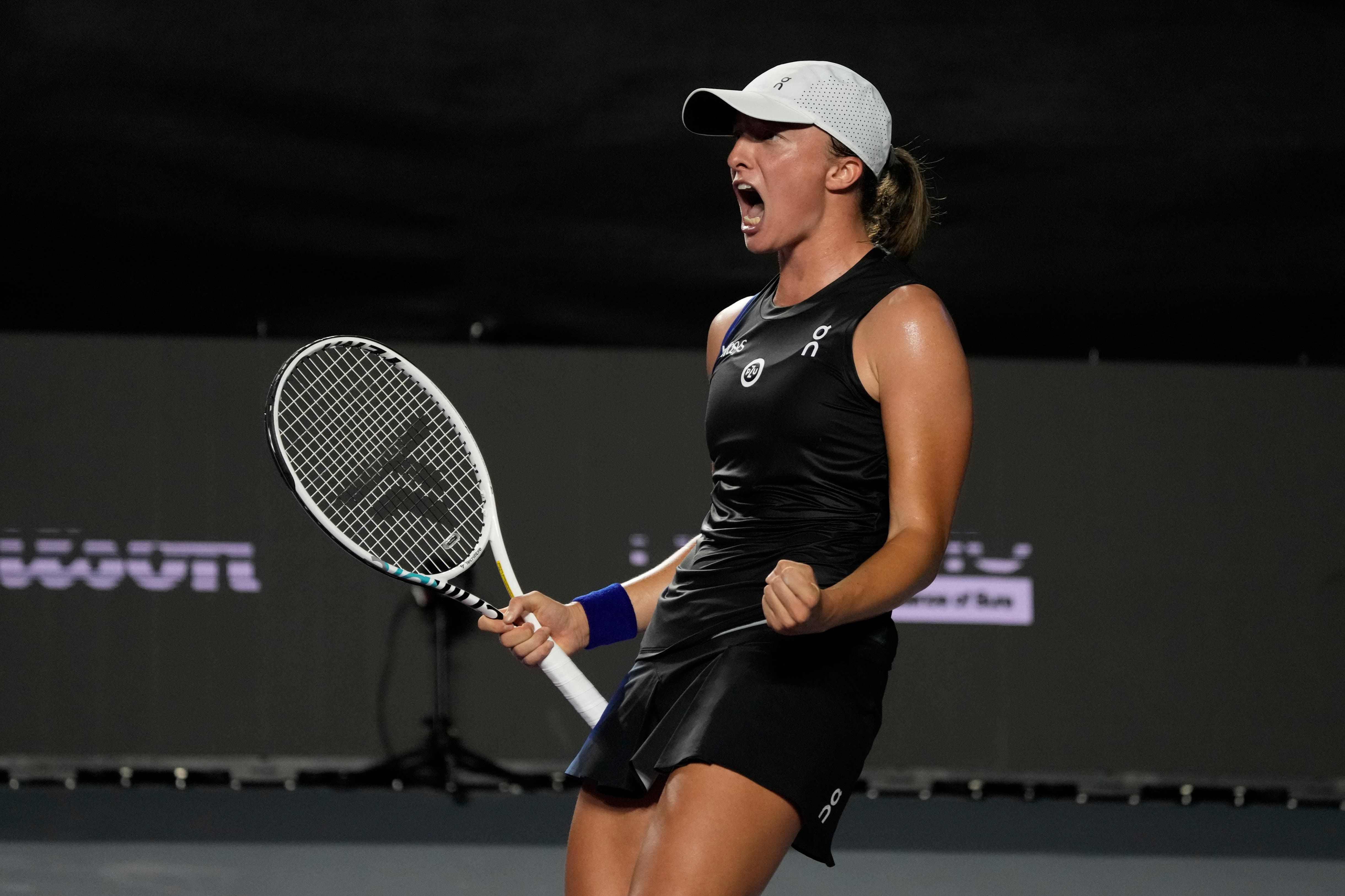 Iga Swiatek celebrates after defeating Aryna Sabalenka (Fernando Llano/ AP)